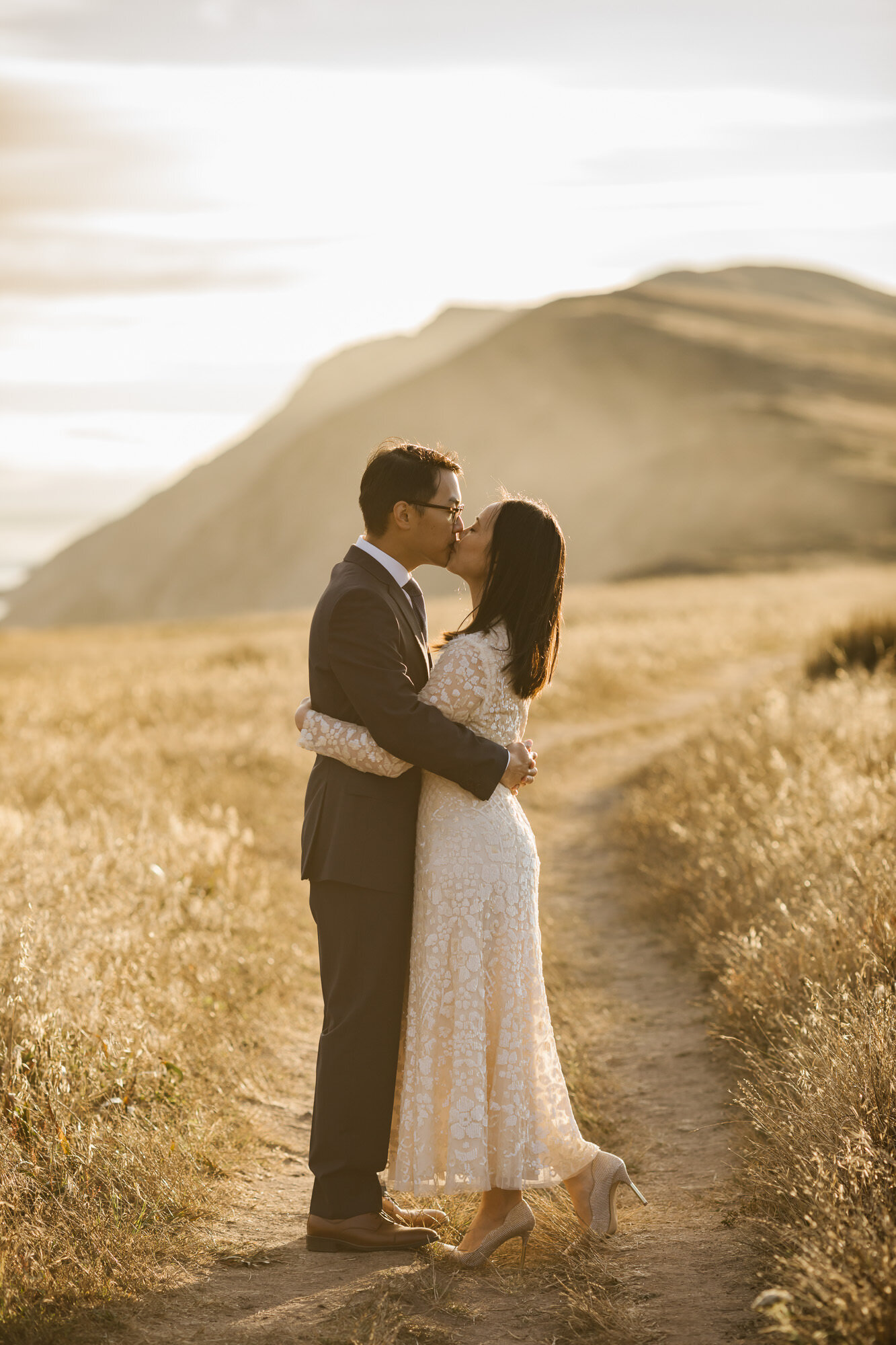 Couple kiss to celebrate their elopement in Point Reyes