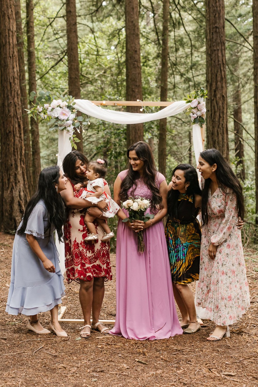 Bride and her friends at her redwood forest elopement