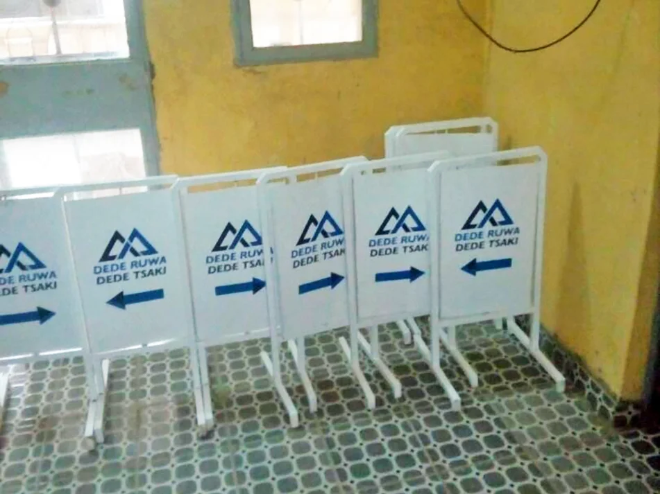 Freshly painted signs for Dede Ruwa Dede Tsaki to be given to participating fadas across implementing villages