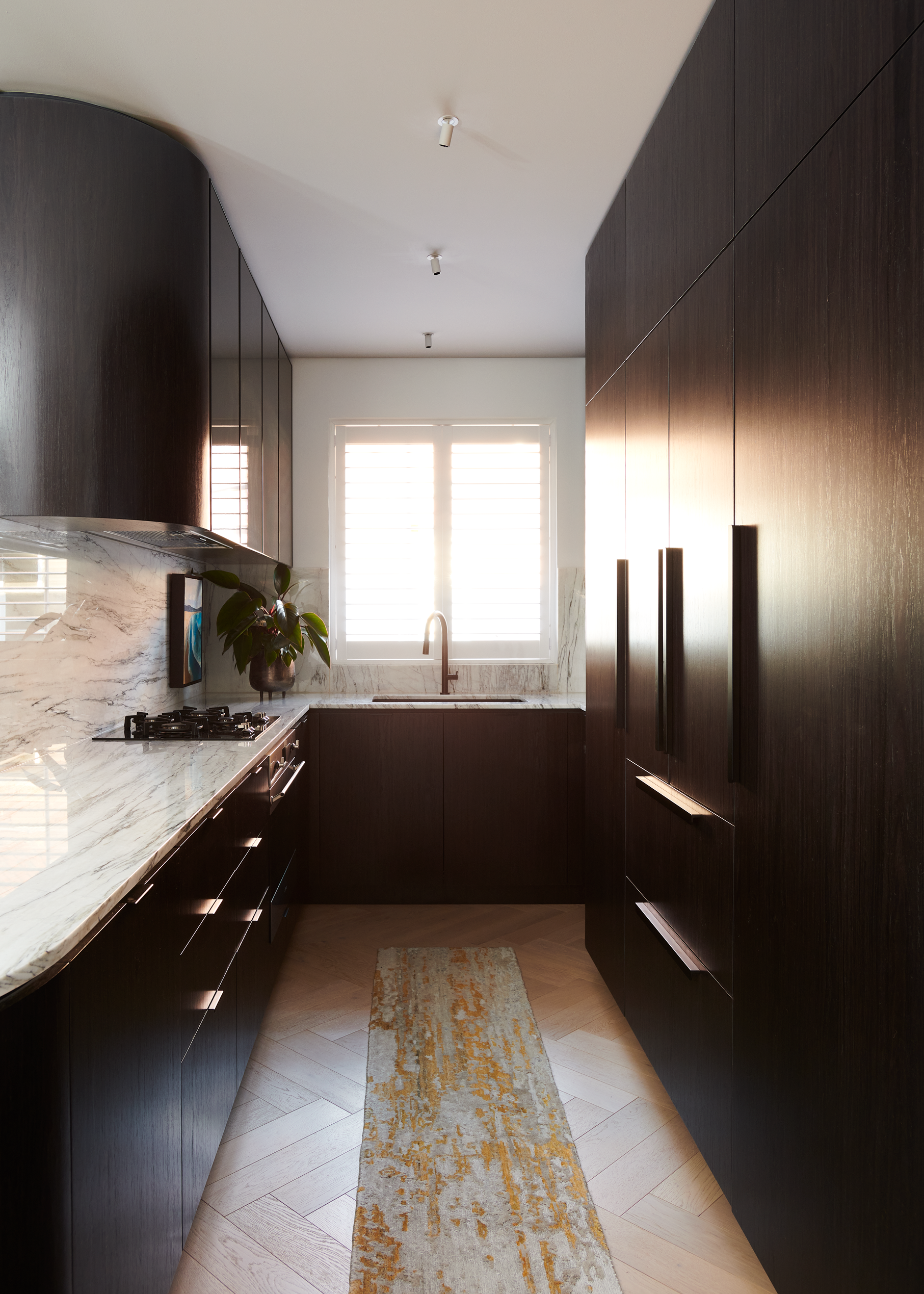 Contemporary luxury kitchen design at Double Bay Residence Sydney with custom cabinetry, marble surfaces and bespoke interior detailing by Luis La Pegna.