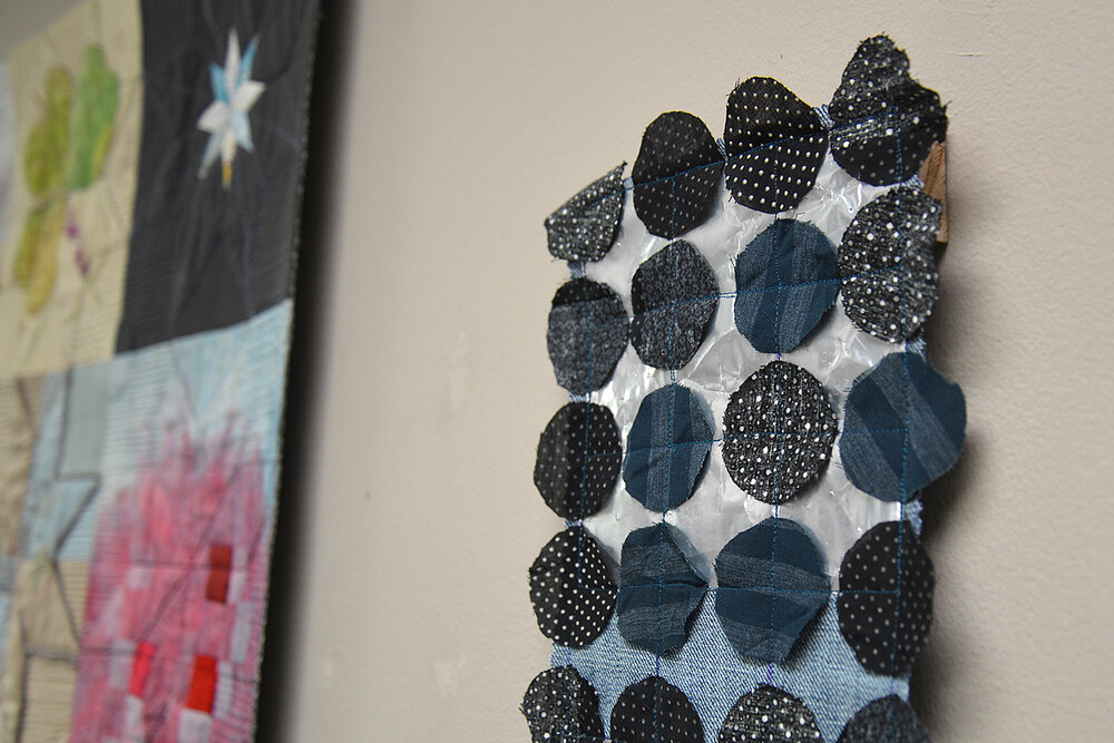   Nightshine  detail, made of fabric, thread, and metalized plastic film (coffee bags) 