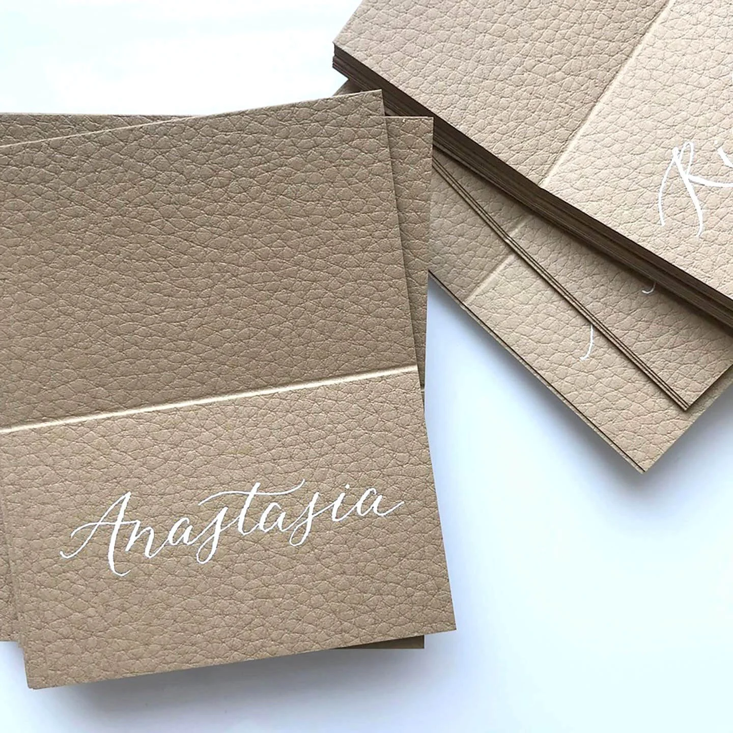 modern-calligraphy-on-leather-place-card.jpg