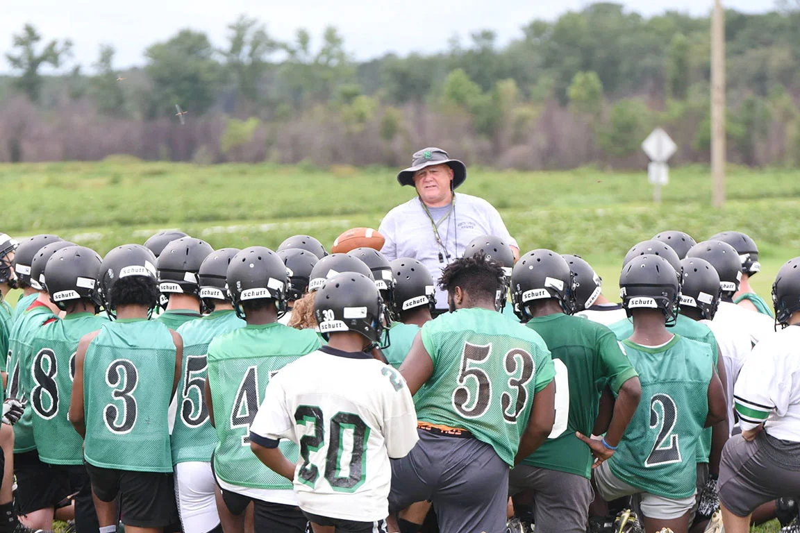 North Lenoir football coach Jim Collins talks to his team during Monday's practice. Photo by William 'Bud' Hardy