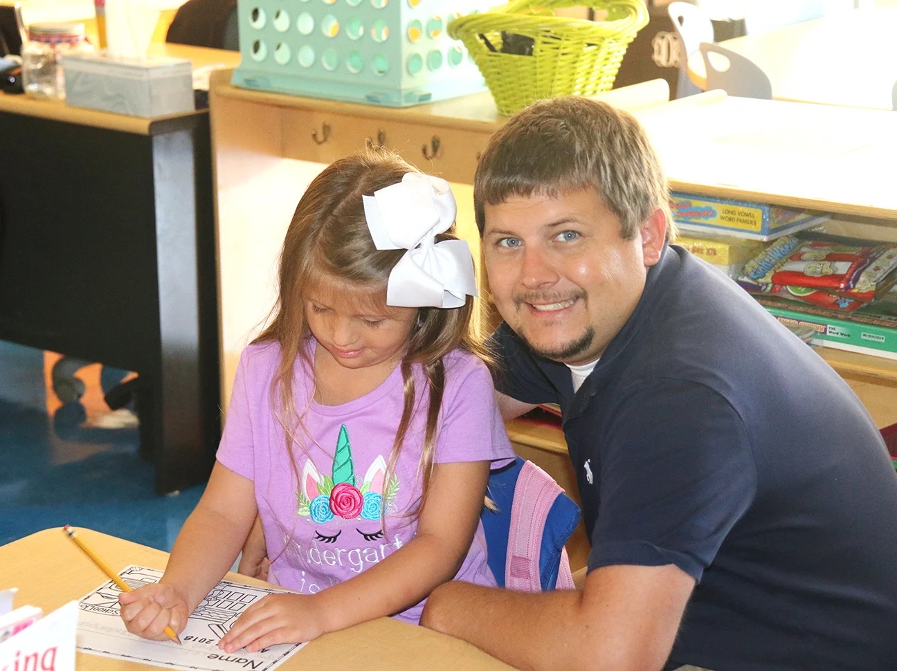 Leigha Floyd, left, kindergarten, Banks Elementary School, with her father, Franklin, who was a kindergarten student in this very same classroom in 1988!
