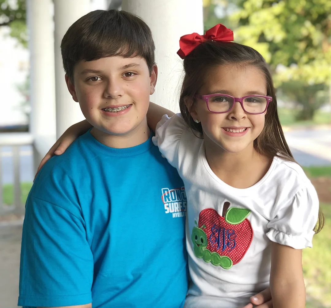 Turner White, left, eighth grade, Woodington Middle School; Ella Grace White, first grade, Pink Hill Elementary School