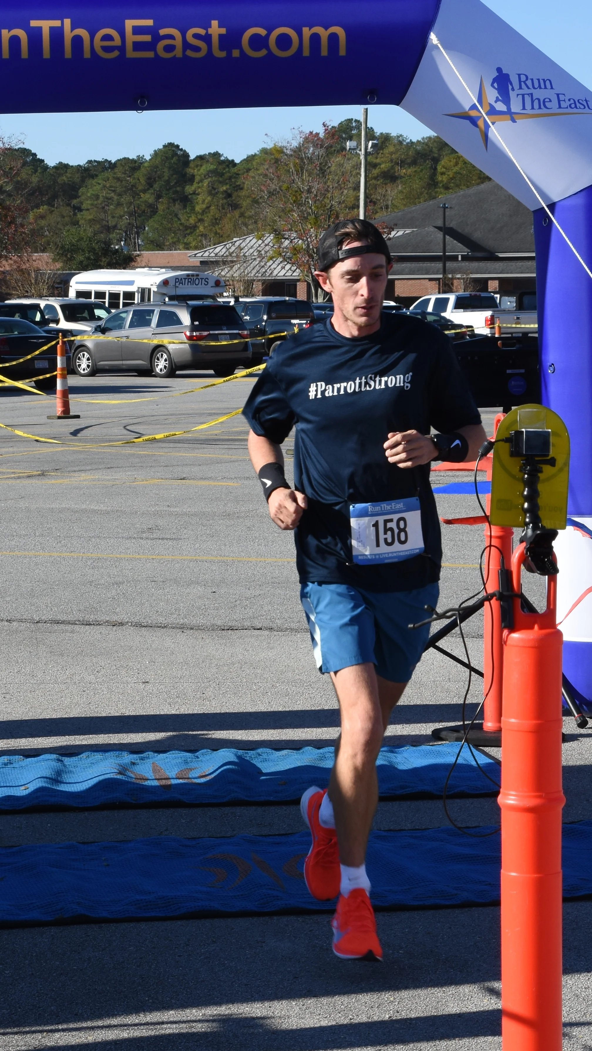 Parrott staff member Tate Mooring takes first place in the school’s ‘Miles for Meaning’ fundraising 5K.