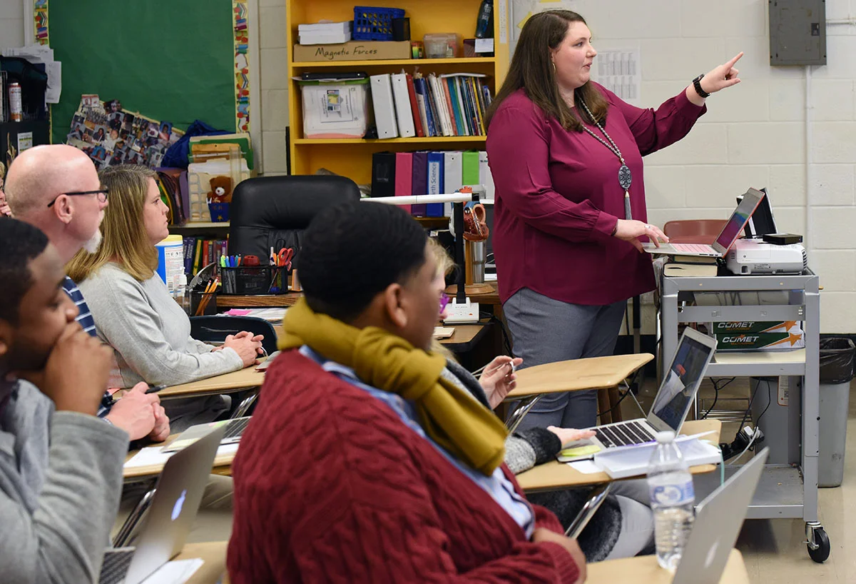 Suzanne Moye, the digital learning specialist at E.B. Frink Middle School, leads a professional development session for middle school teachers on SchoolNet, a program that helps teachers identify strengths and weaknesses in students’ learning and adapt lessons to support them. Photo by Patrick Holmes / Lenoir County Public Schools