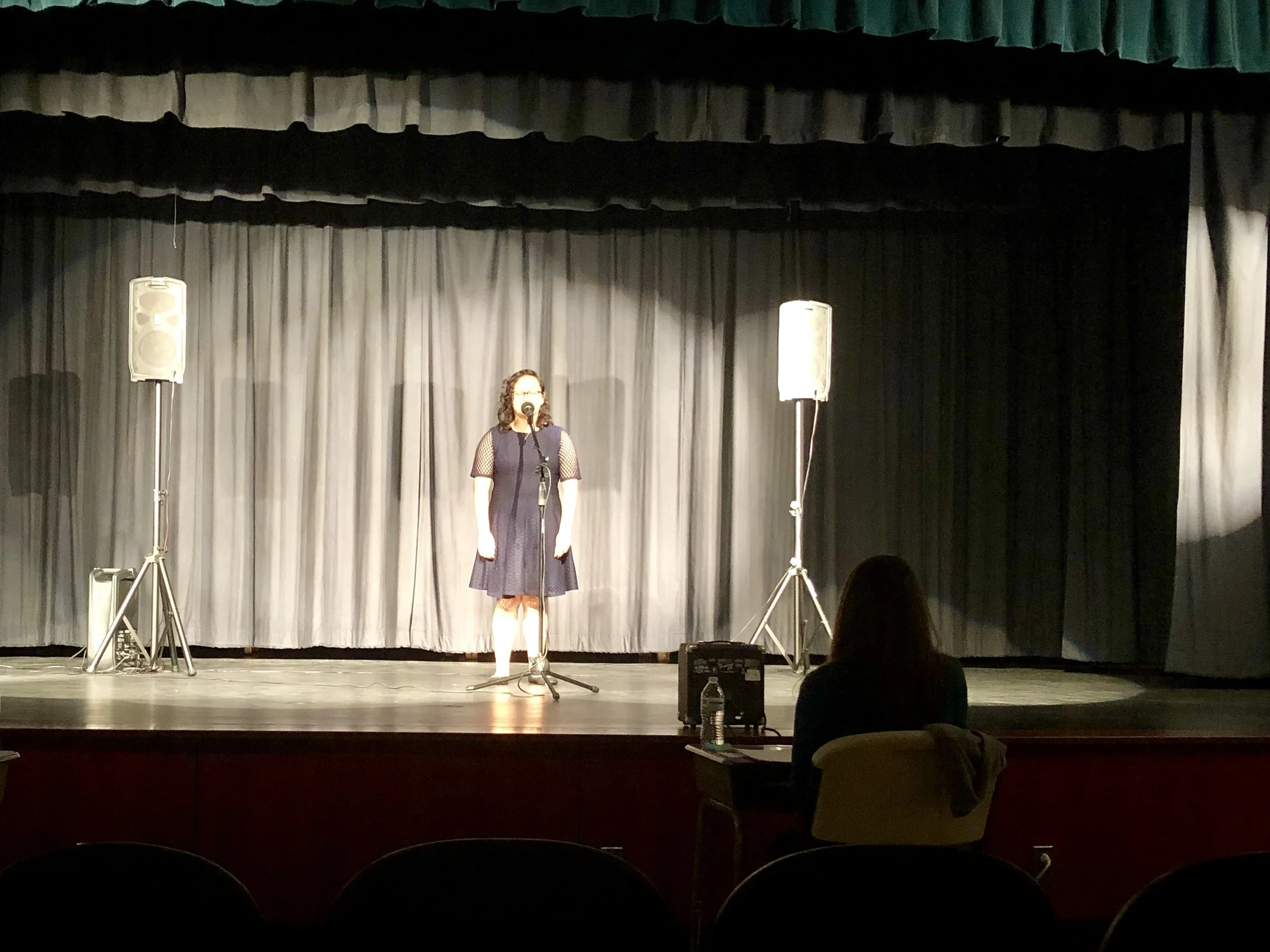 Anahi Zapata recites “Be Music, Night” by Kenneth Patchen. Photo by Catherine Hardee / Neuse News