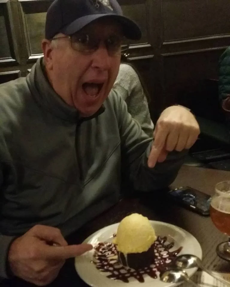 Bryan Hanks asks waitress which end of the spoon he’s supposed to use / Photo by Jon Dawson - Neuse News