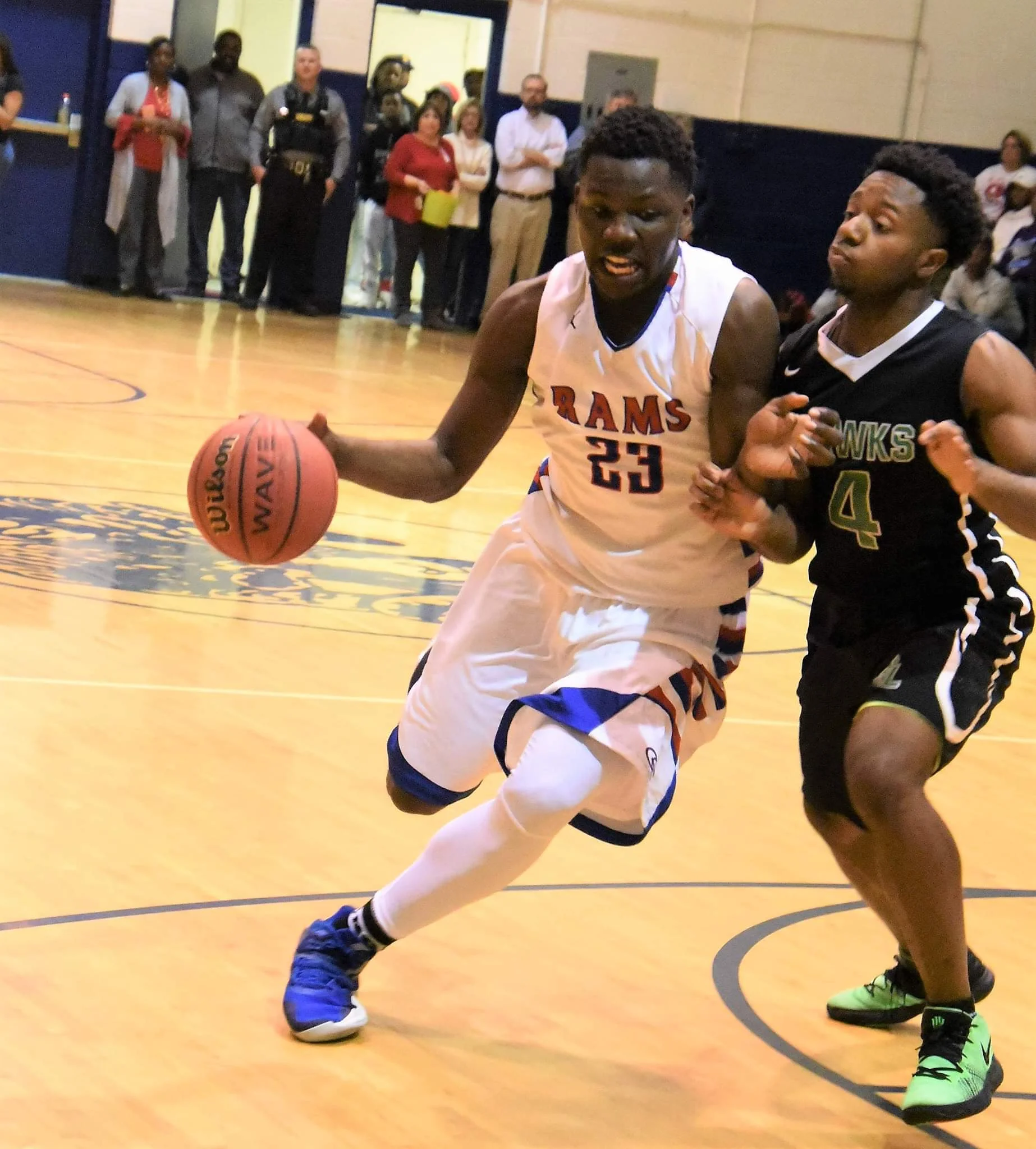Greene Central’s Imajae Dodd drives on North Lenoir’s Terrance Copper on Feb. 1. Both teams reached the postseason as the Rams will be a No. 2 seed and the Hawks picked up the No. 22 seed. Photo by William ‘Bud’ Hardy / Neuse News