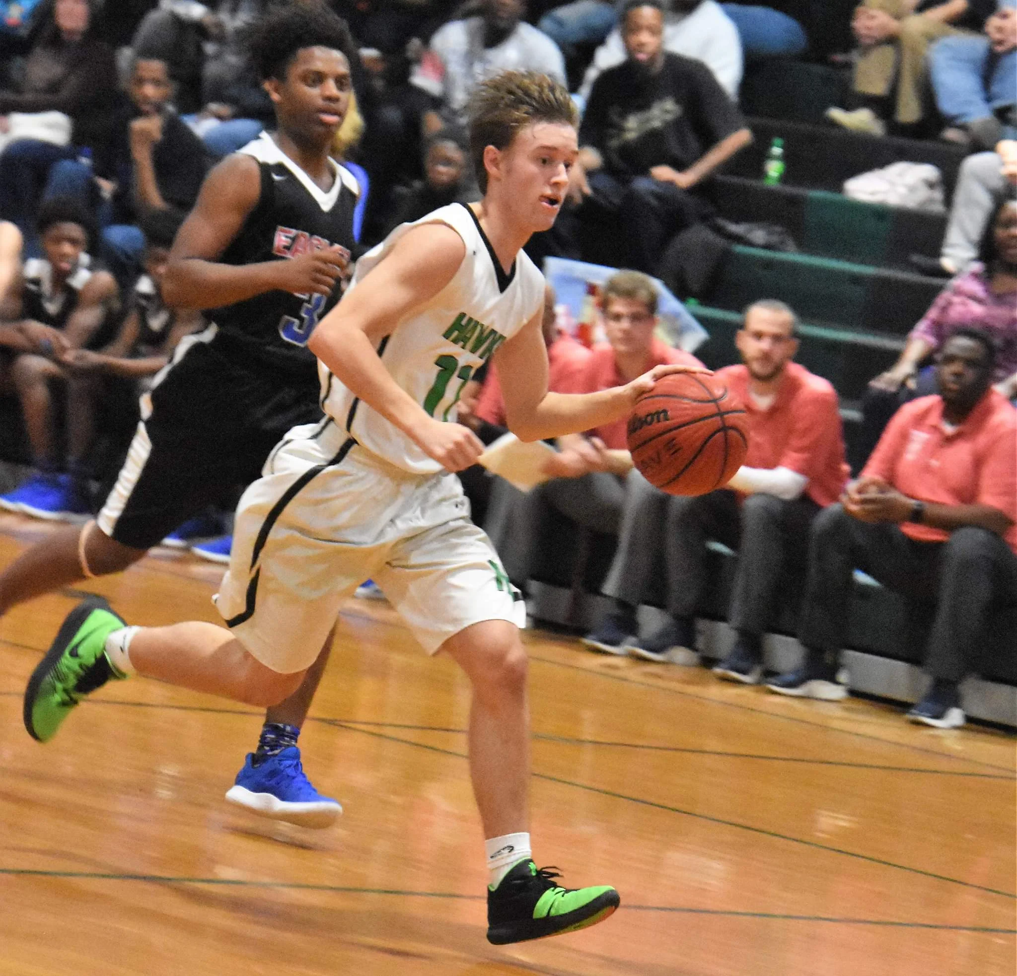 West Craven’s Latrell Campbell is in pursuit of North Lenoir’s Trevor Sears in a Jan. 25 contest. The Eagles start the postseason on the road as a No. 18 seed. Photo by William ‘Bud’ Hardy / Neuse News