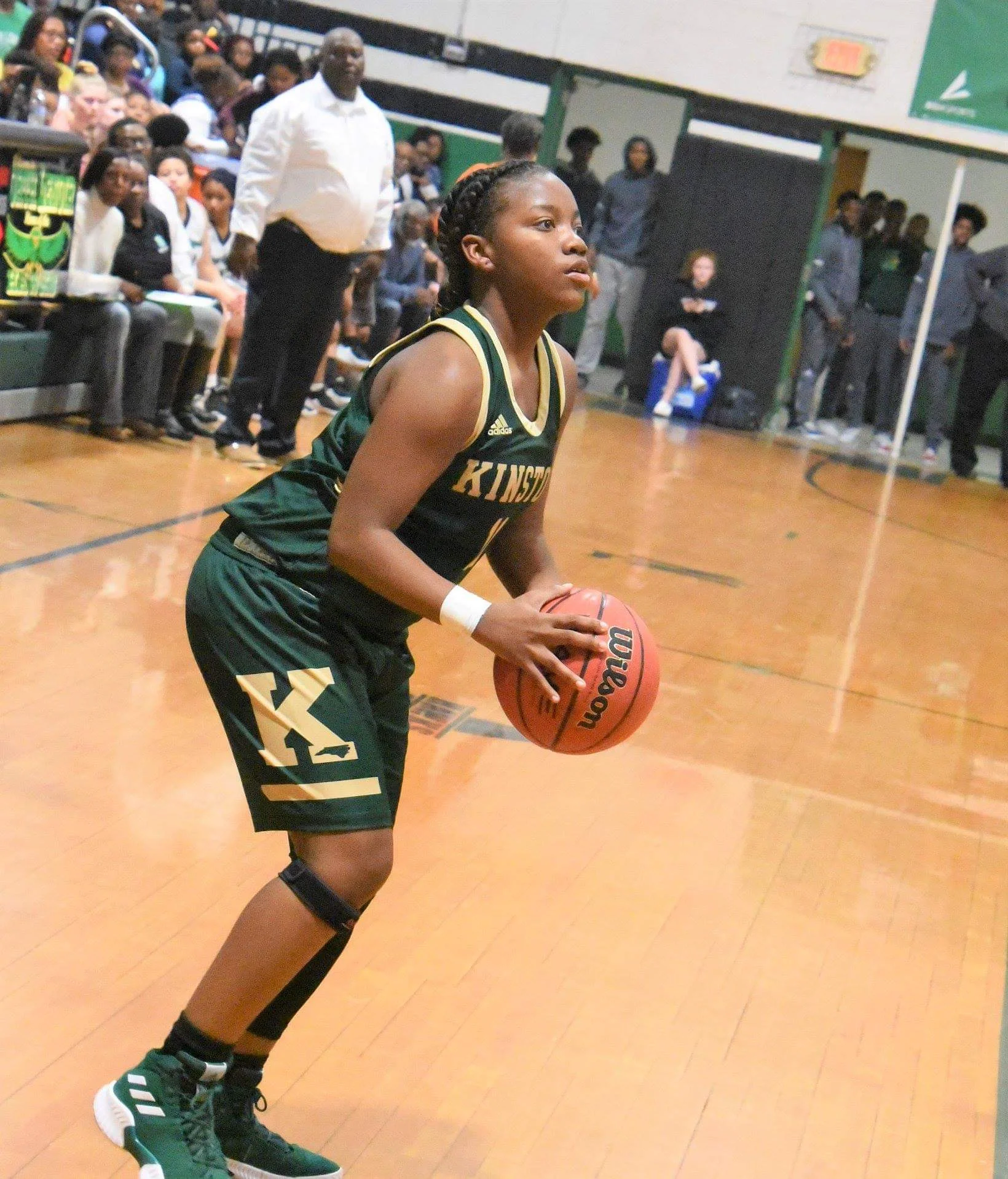Kinston’s Michyla Dove prepares to take a 3-pointer in a game against North Lenoir Jan. 22. The Vikings won the ECC and received a No. 3 seed in the state playoffs. Photo by William ‘Bud’ Hardy / Neuse News