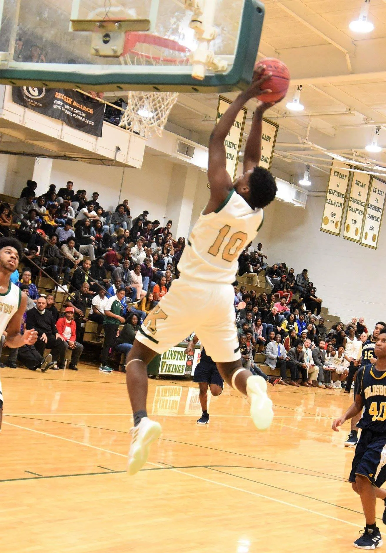 Kinston’s Judah McBynum skies for a basket in Kinston’s game against Goldsboro Dec. 20, 2018. Photo by William “Bud” Hardy
