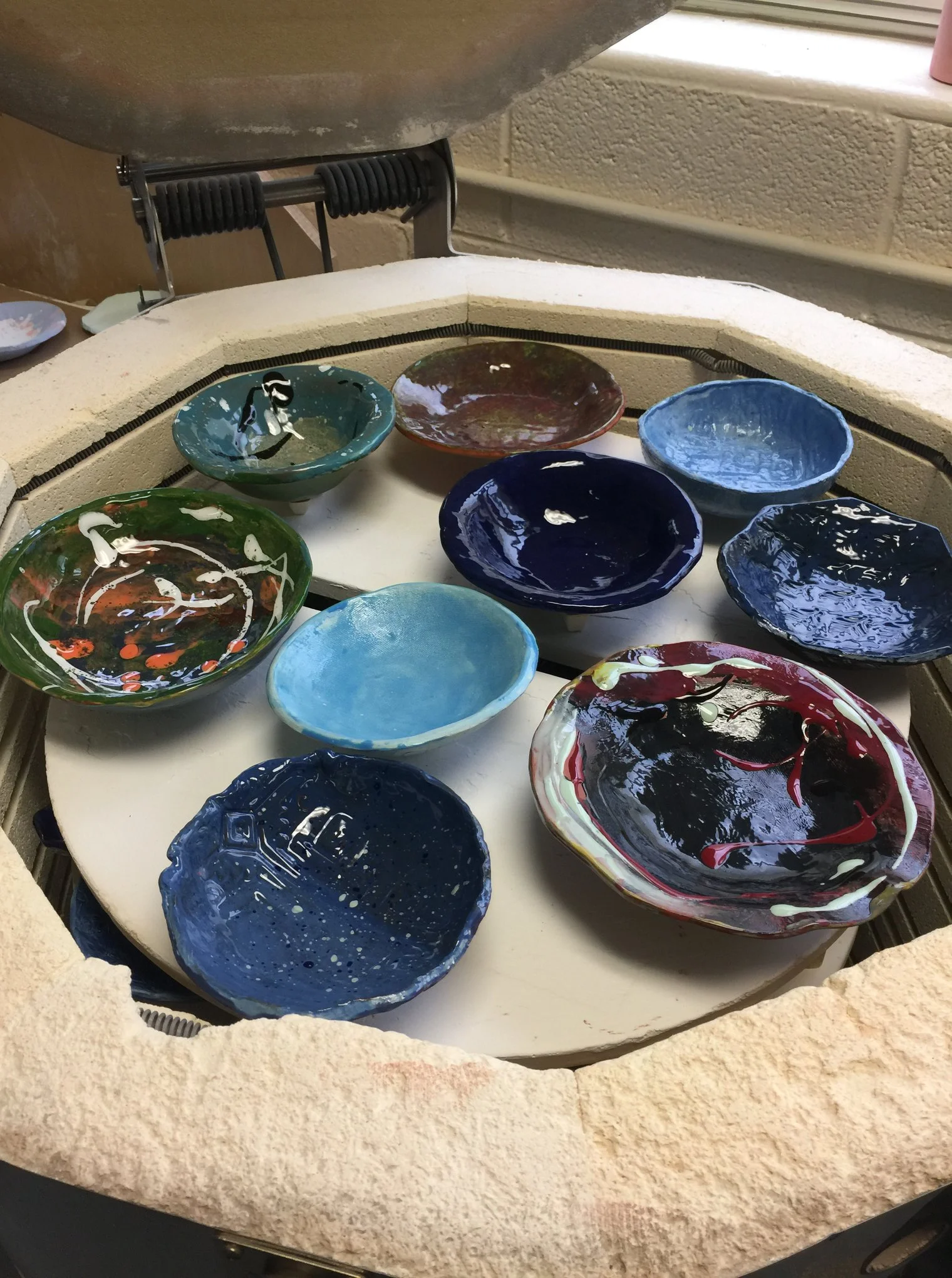 Handmade pottery bowls come out of the kiln for this week’s fundraiser. Submitted Photo