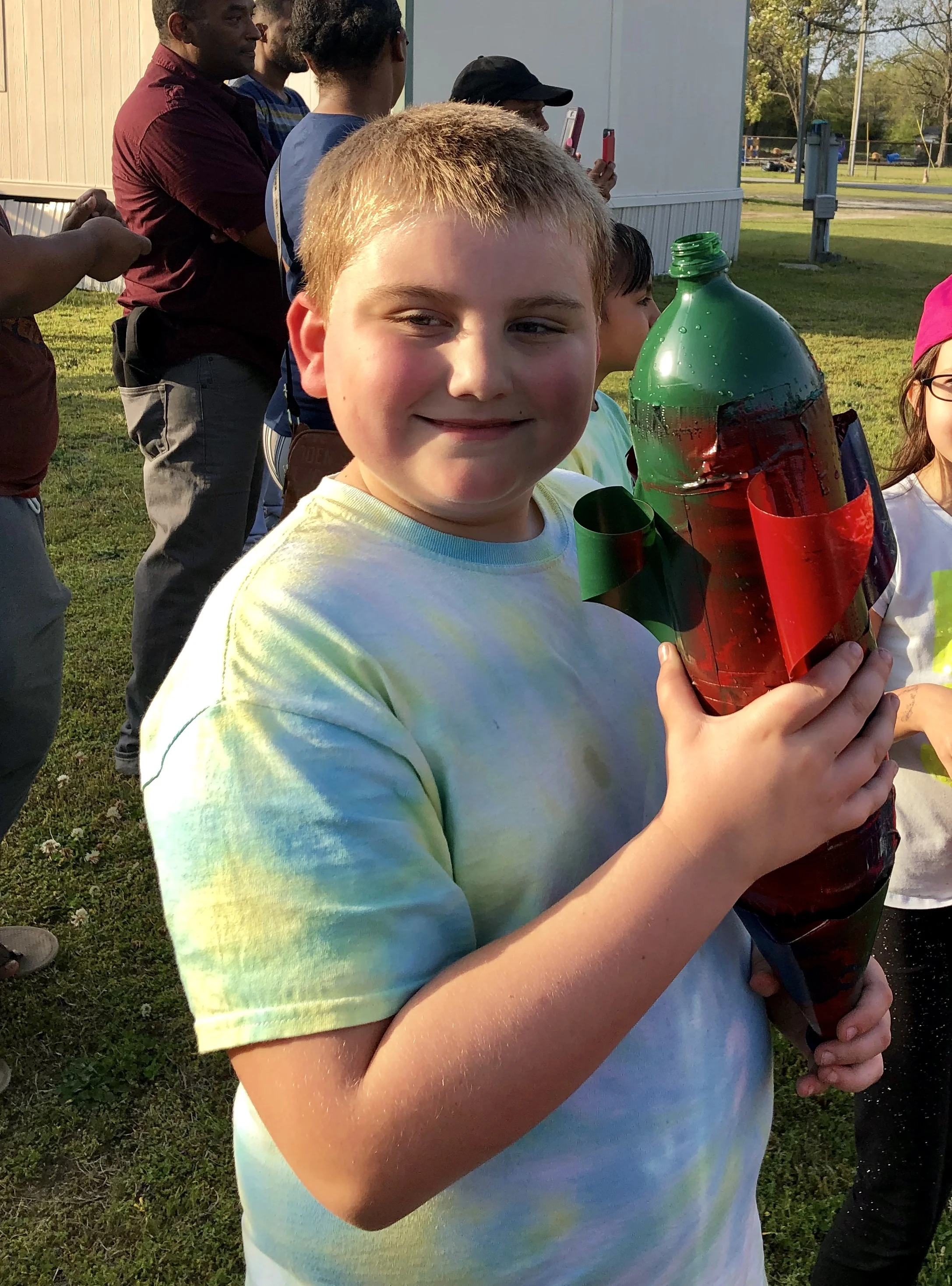 Third-grader Easton Vinson holds his rocket prior to shooting it off. Photo by Catherine Hardee / Neuse News