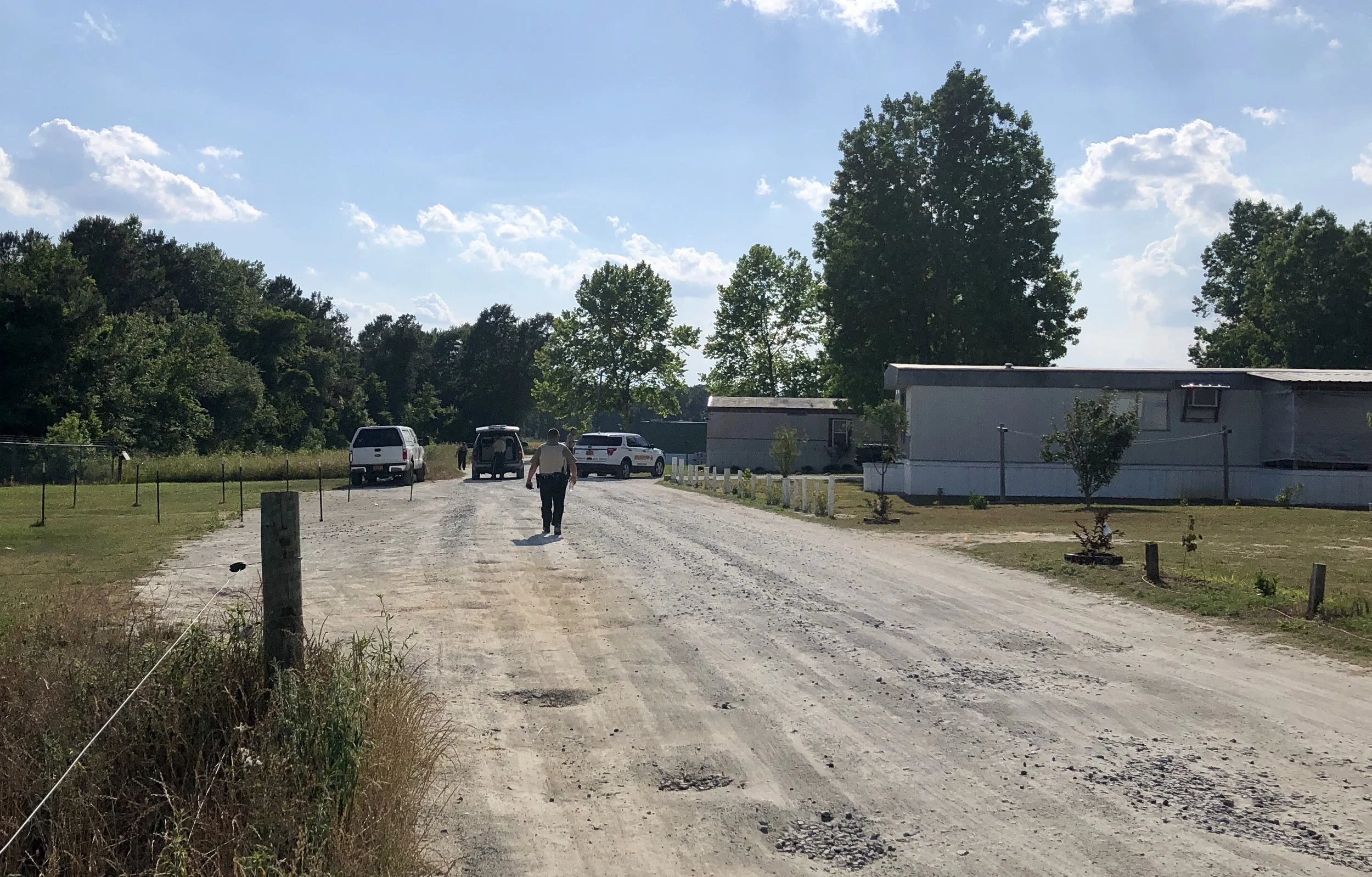 Deputies with the LCSO continue to investigate the scene where shots were fired on Monday on Lonnie Lane in Pink Hill. Photo by Catherine Hardee / Neuse News