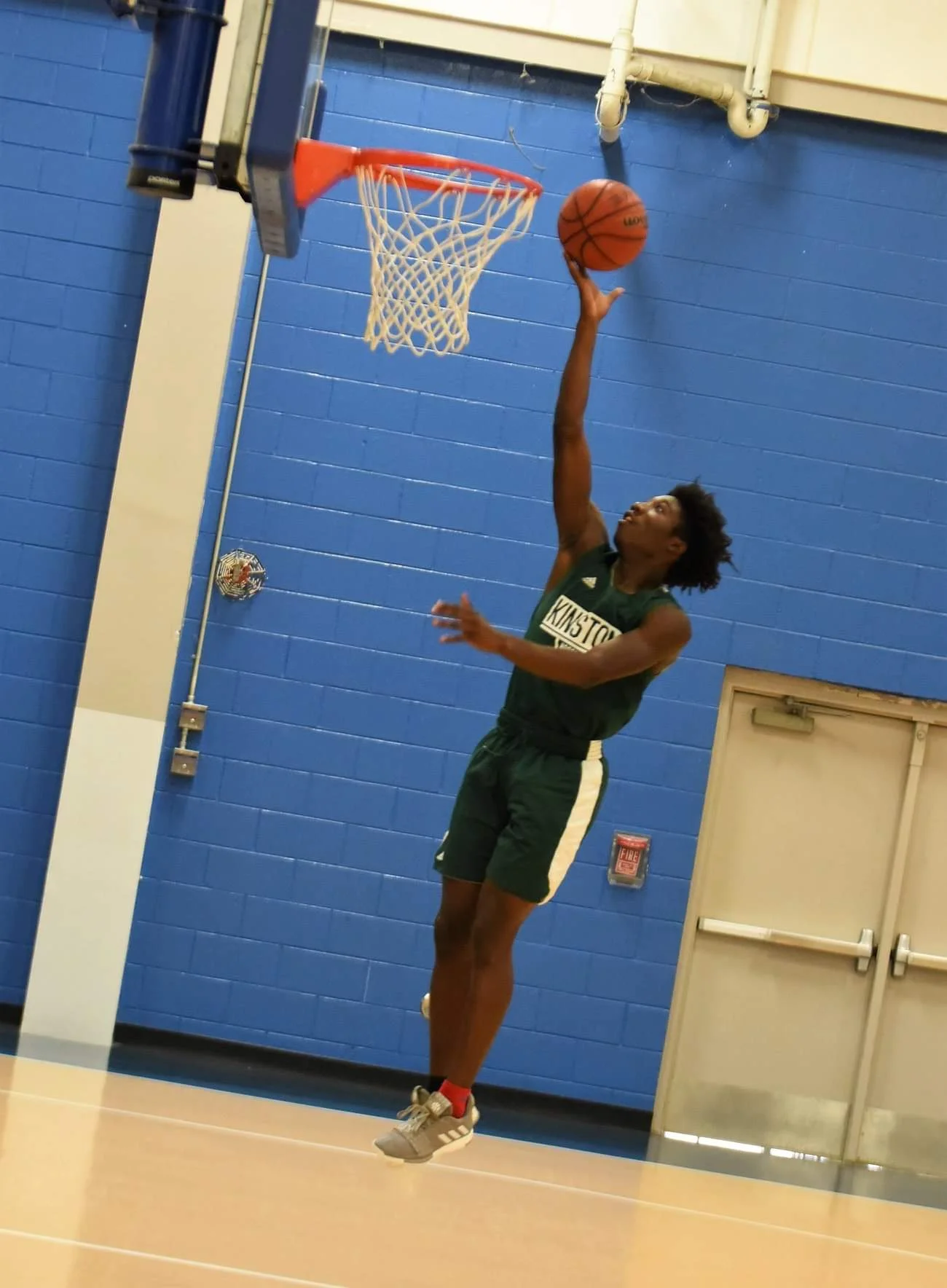 Kinston’s Will London goes up for a basket against Wilmington Laney Saturday. Photo by William ‘Bud’ Hardy / Neuse News
