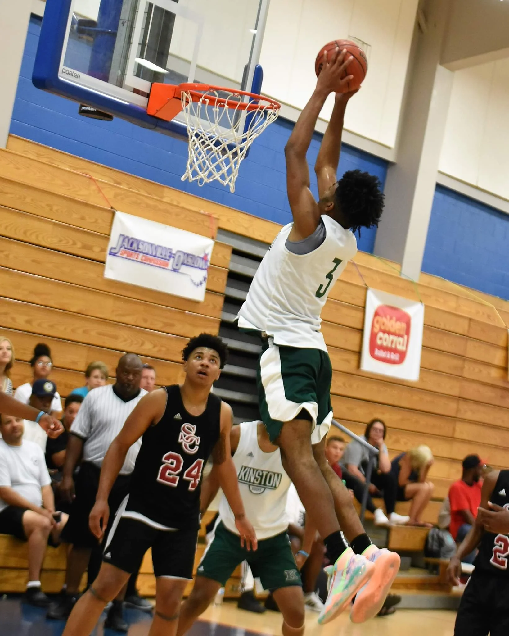 Kinston’s Dontrez Styles slams home two of his 27 points Sunday in the East Coast Invitational championship game. Photo by William ‘Bud’ Hardy / Neuse News