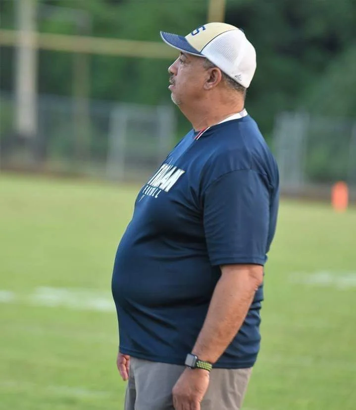 Jones Senior's Hampton steps down