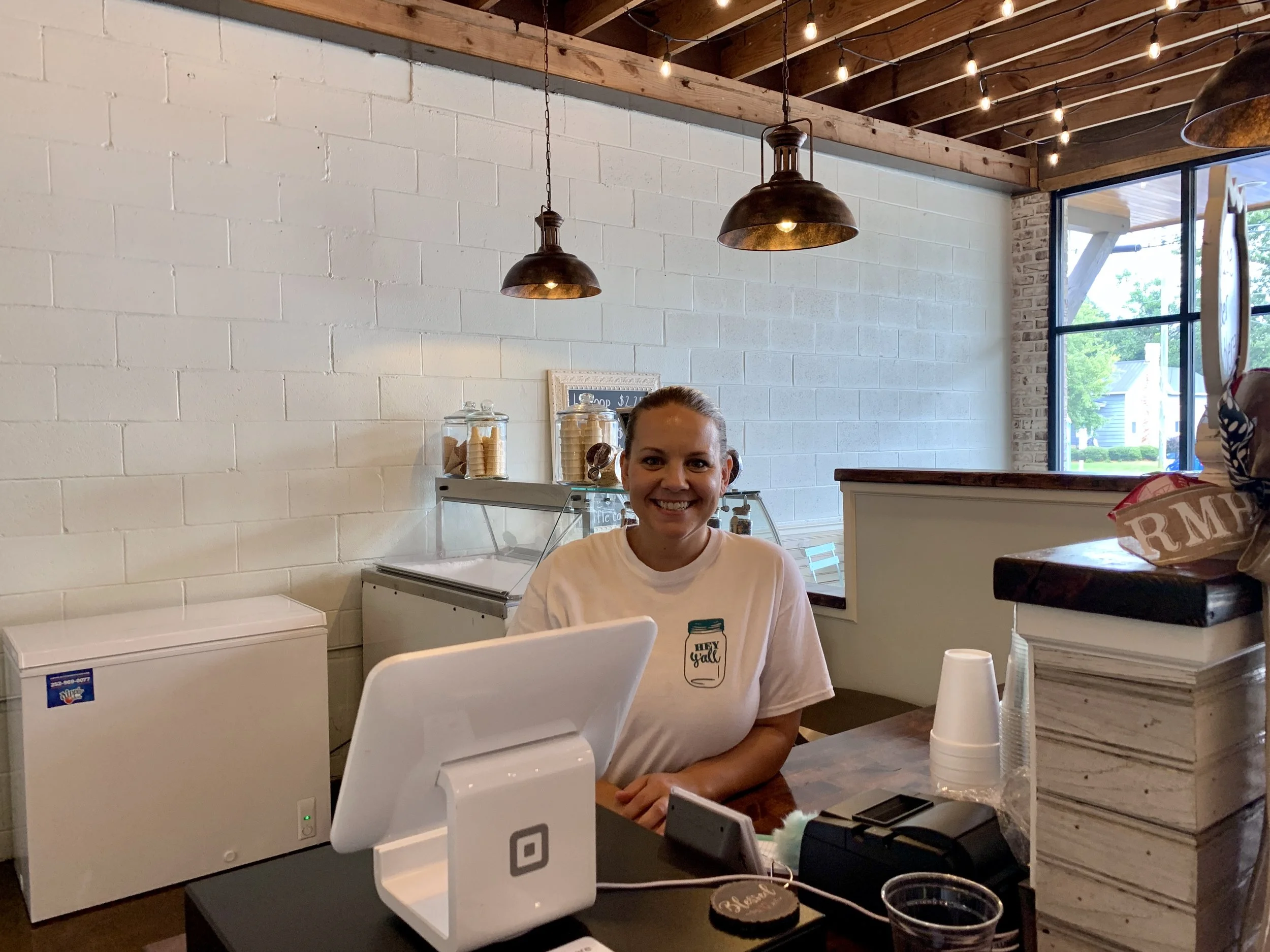 Ashley Smith stands behind the counter of her new restaurant in Deep Run. Photo by Catherine Hardee / Neuse News