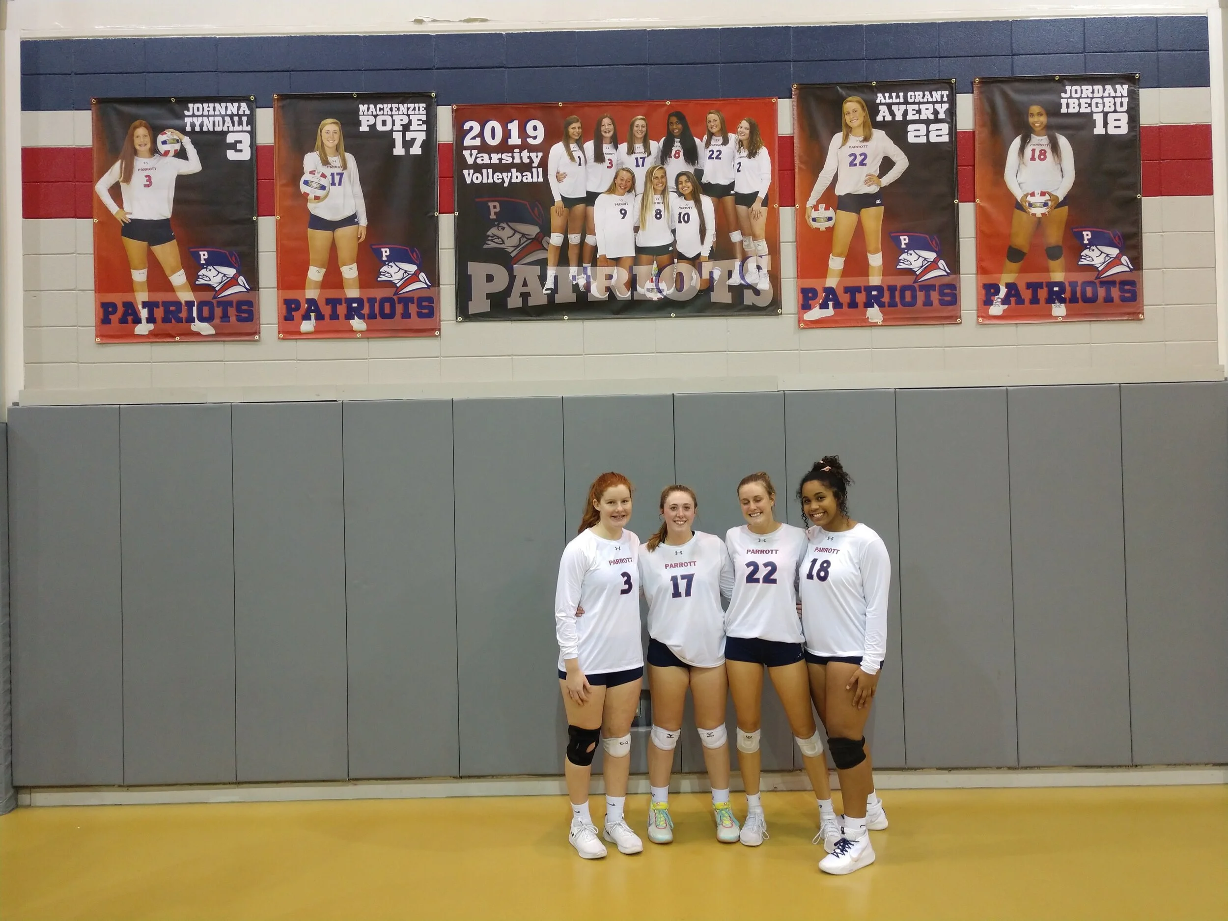 Arendell Parrott’s seniors, from left, Johnna Tyndall, Mackenzie Pope, Alli Grant Avery and Jordan Ibegbu enjoyed a win in their final regular-season home game Tuesday. Photo by Junious Smith III / Neuse News