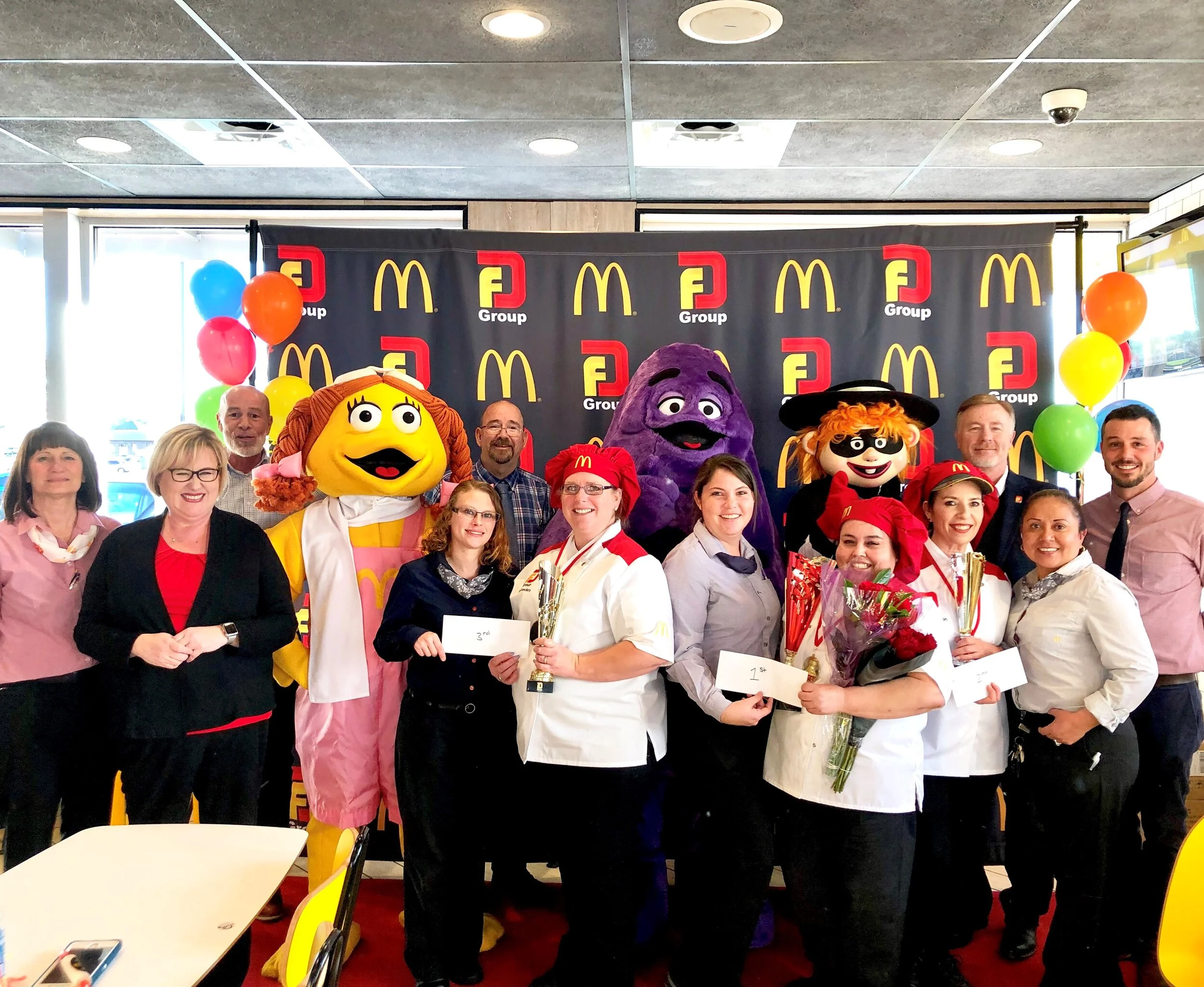 Bake-Off participants pose with their winnings. Submitted photo.