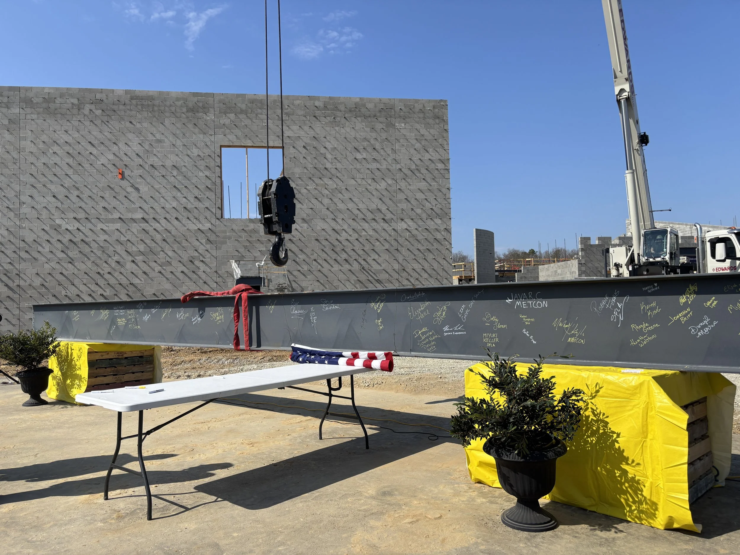 LCPS marks milestone with topping-out ceremony for new E.B. Frink Middle School