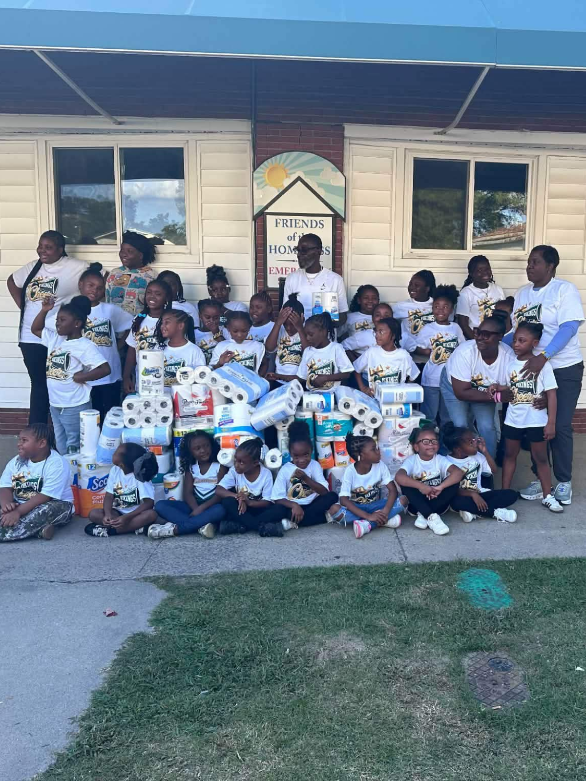Holloway cheerleaders give back with donations to homeless shelter