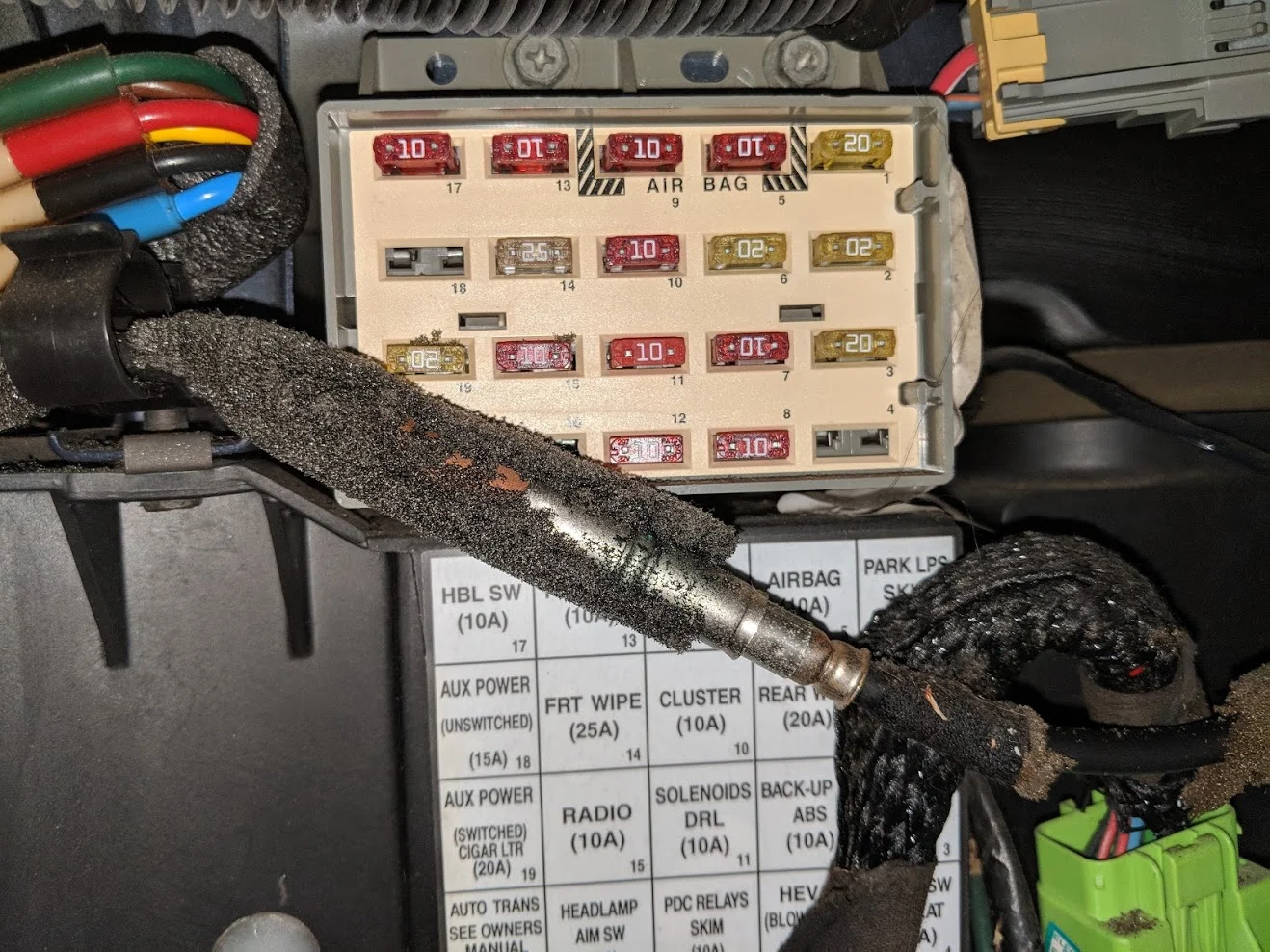 My “Door Jam Defeat” fuse was located in the bottom right (it’s been removed in the picture)