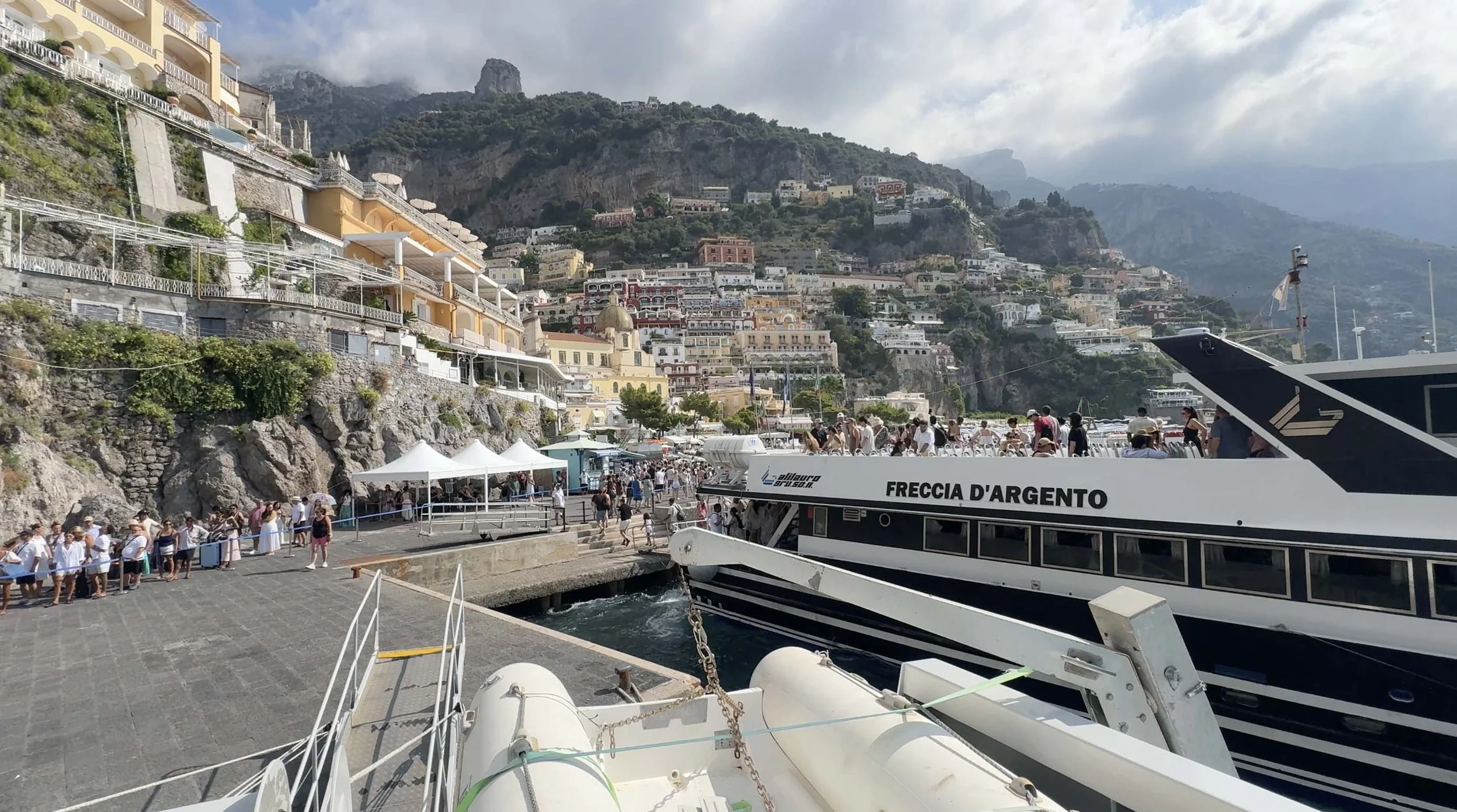 Ferry docked below Positano on the Amalfi Coast in Italy