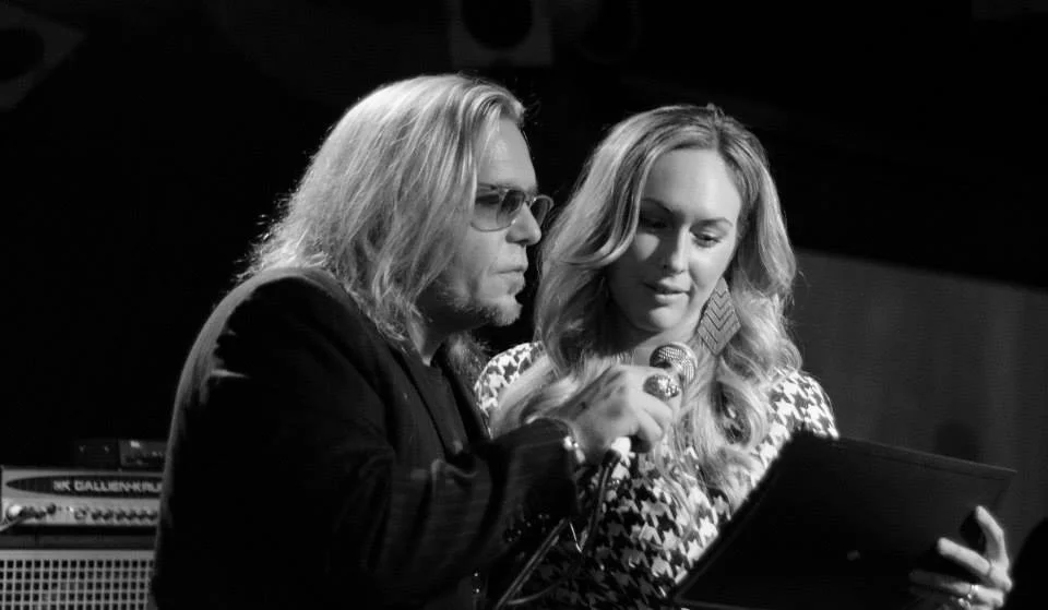 Scott Church & Heather Childs present an award. *Photo Credit: Glimpse Magazine