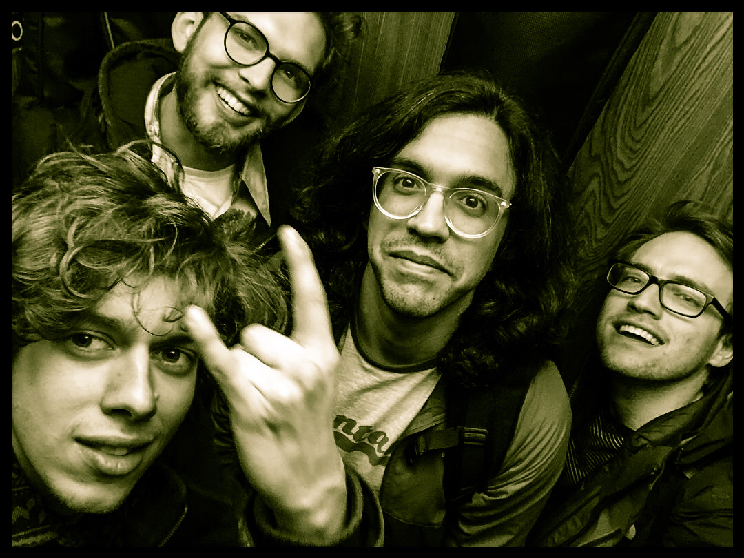 The band riding the elevator at the Power Station after a full day of recording from L to R: Lex, Sean, Kenny, Mike