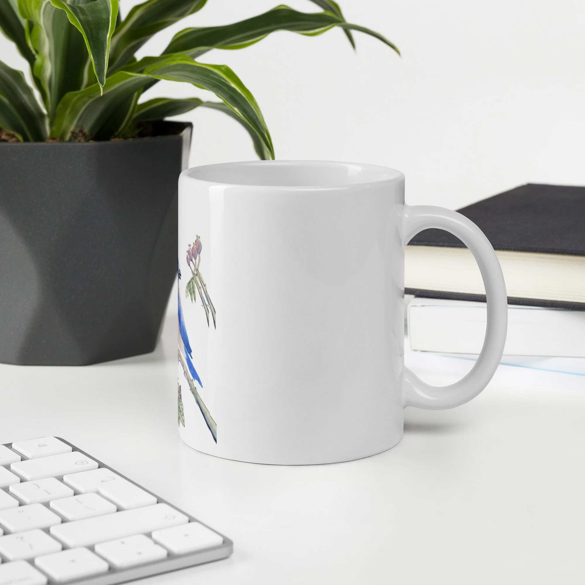 white-glossy-mug-white-11-oz-office-environment-6a923a1d5a995.jpg