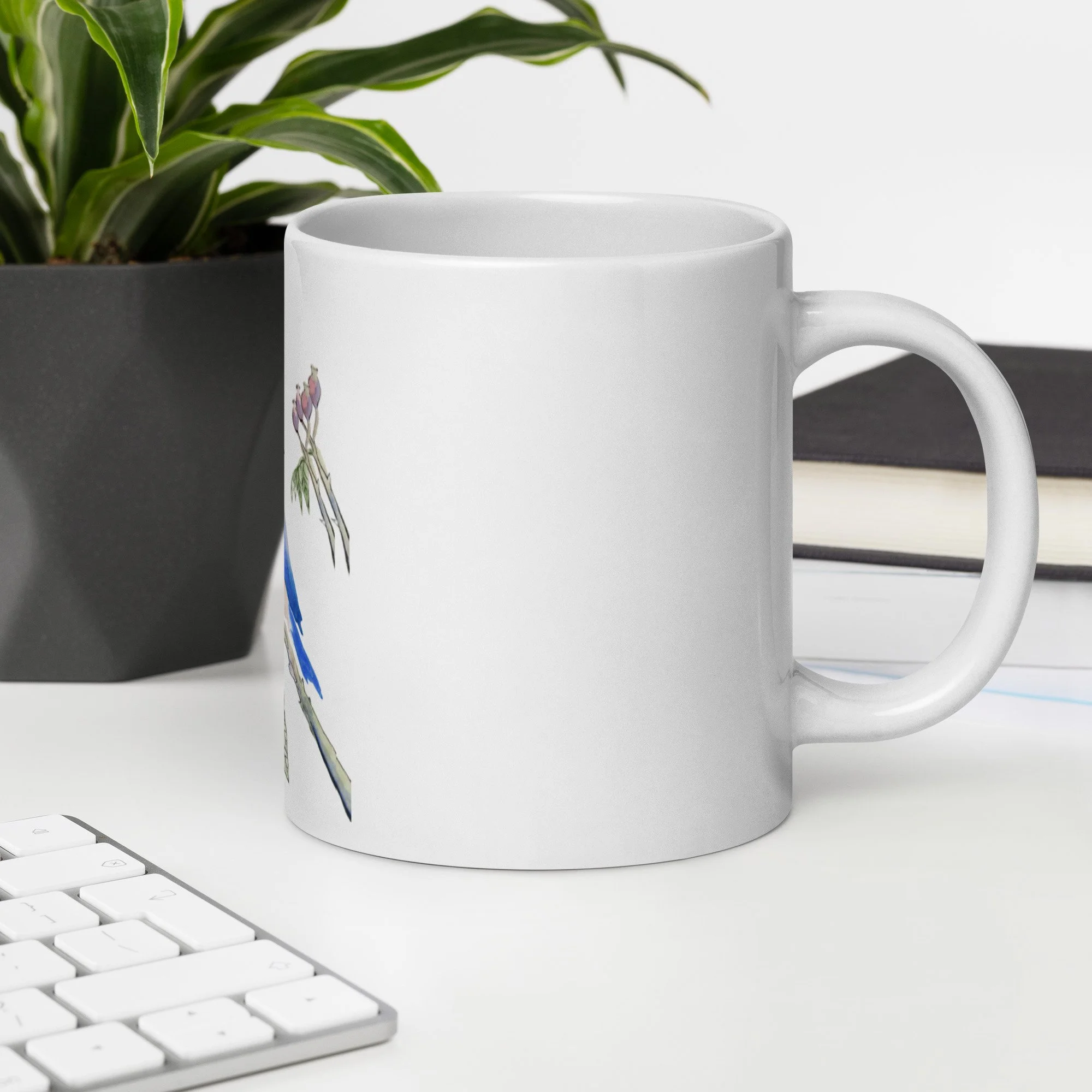 white-glossy-mug-white-20-oz-office-environment-6a923a1d5aae4.jpg