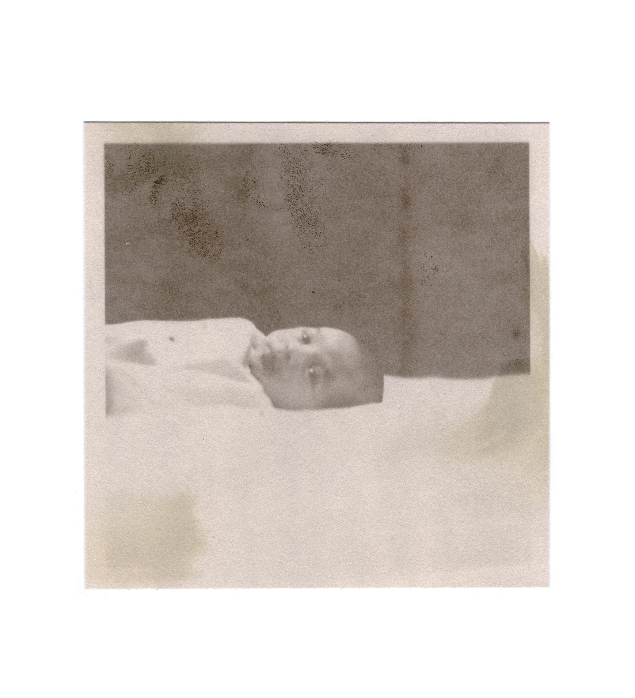 Dennis 2007 salted paper print with Dennis’ mother’s breast milk 5 1/16 x 5 1/8 inches