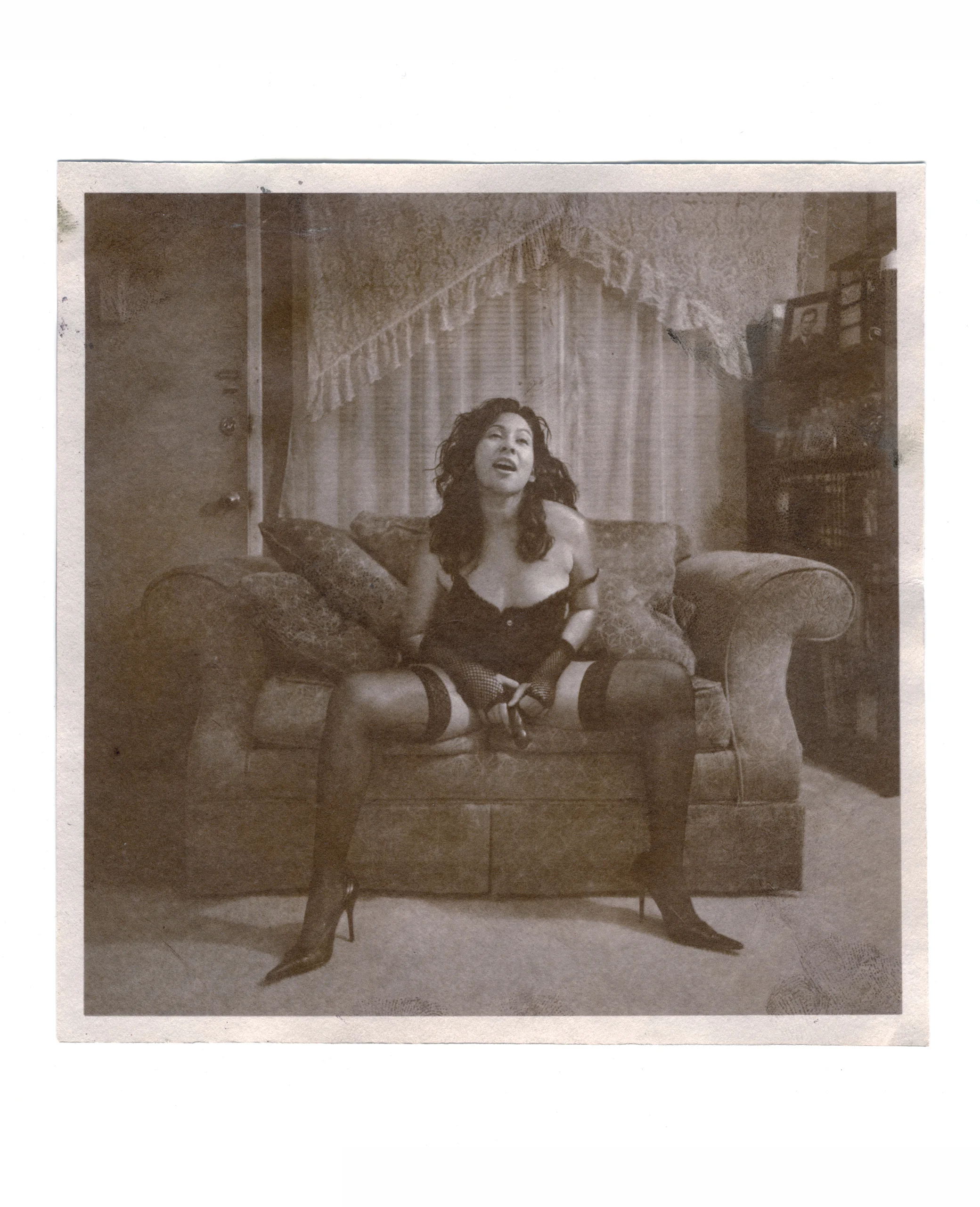 Jackie 2007 salted paper print with Jackie’s skin oil 6 1’16 x 6 1/16 inches