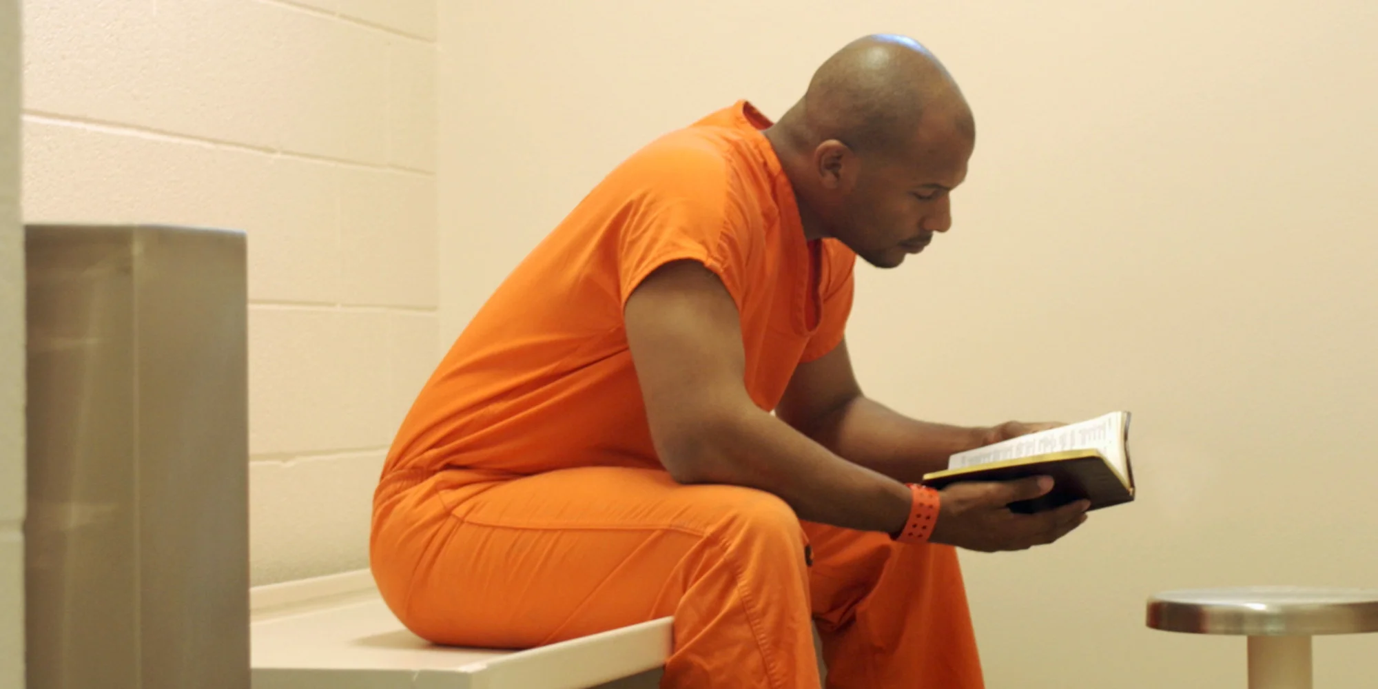Studying-Bible-in-prison.jpg