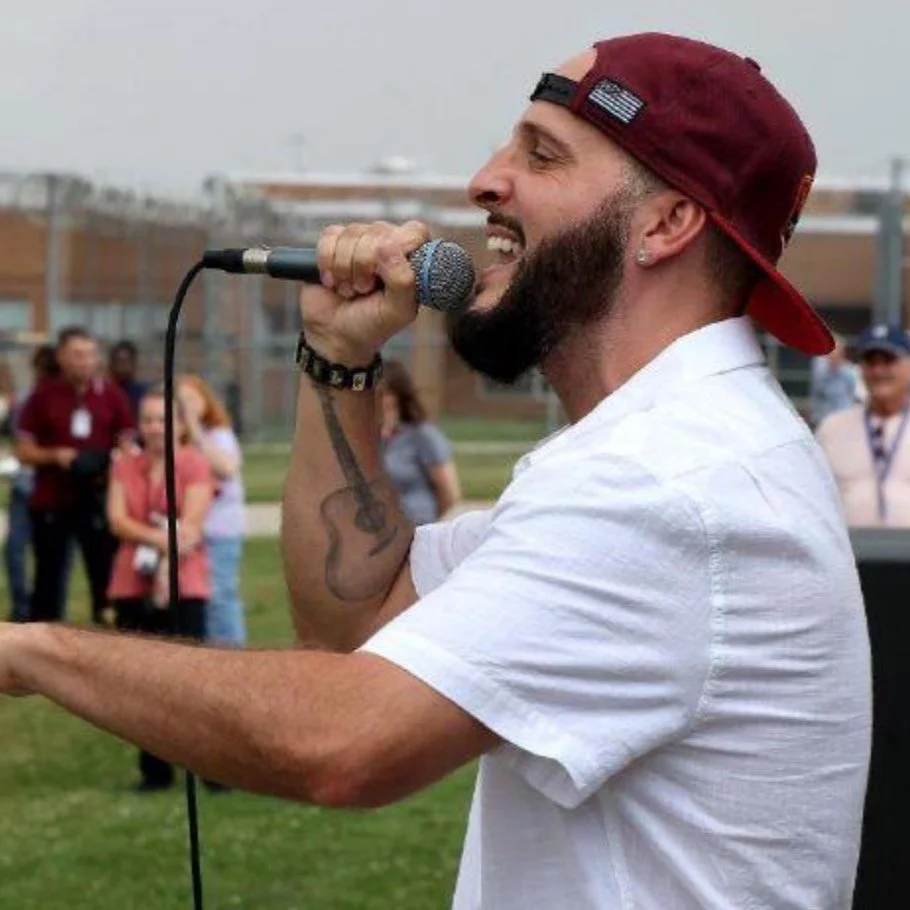Rock the Yard concert battles through rain to deliver ministry to incarcerated individuals