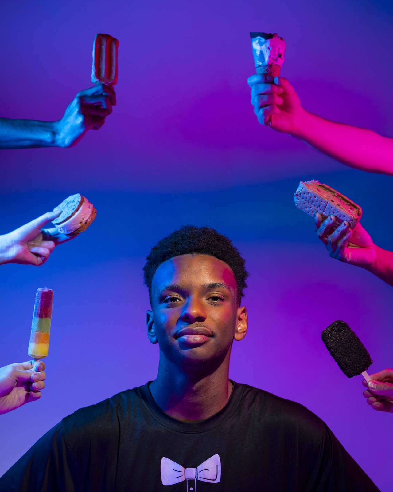 Beau Shell, Lil’ Ice Cream Dude, poses for a portrait with ice cream and popsicles from his Athens, Ga., store, Cool World Ice Cream Shop on September 1, 2022.