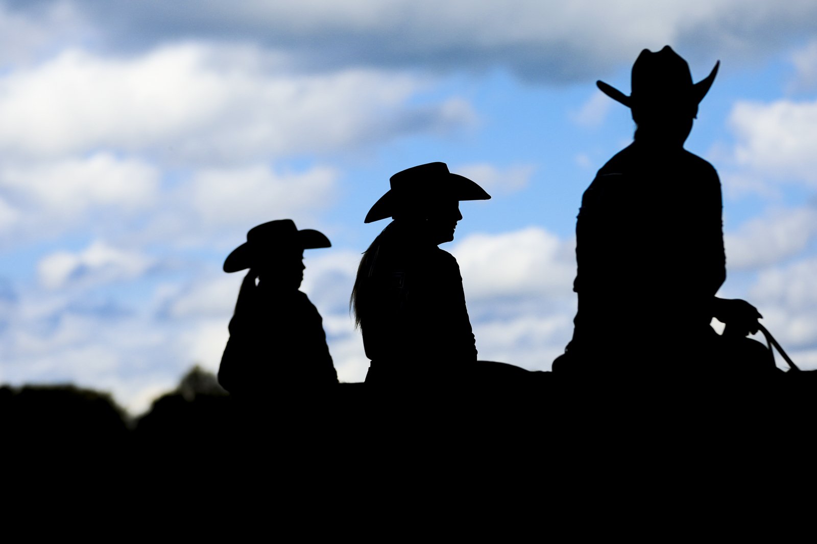 Silhouetted riders during an equestrian meet between Georgia and Texas A&M at the UGA Equestrian Complex in Bishop, Ga., on Thurs., Oct. 29, 2020. (Photo by Chamberlain Smith)