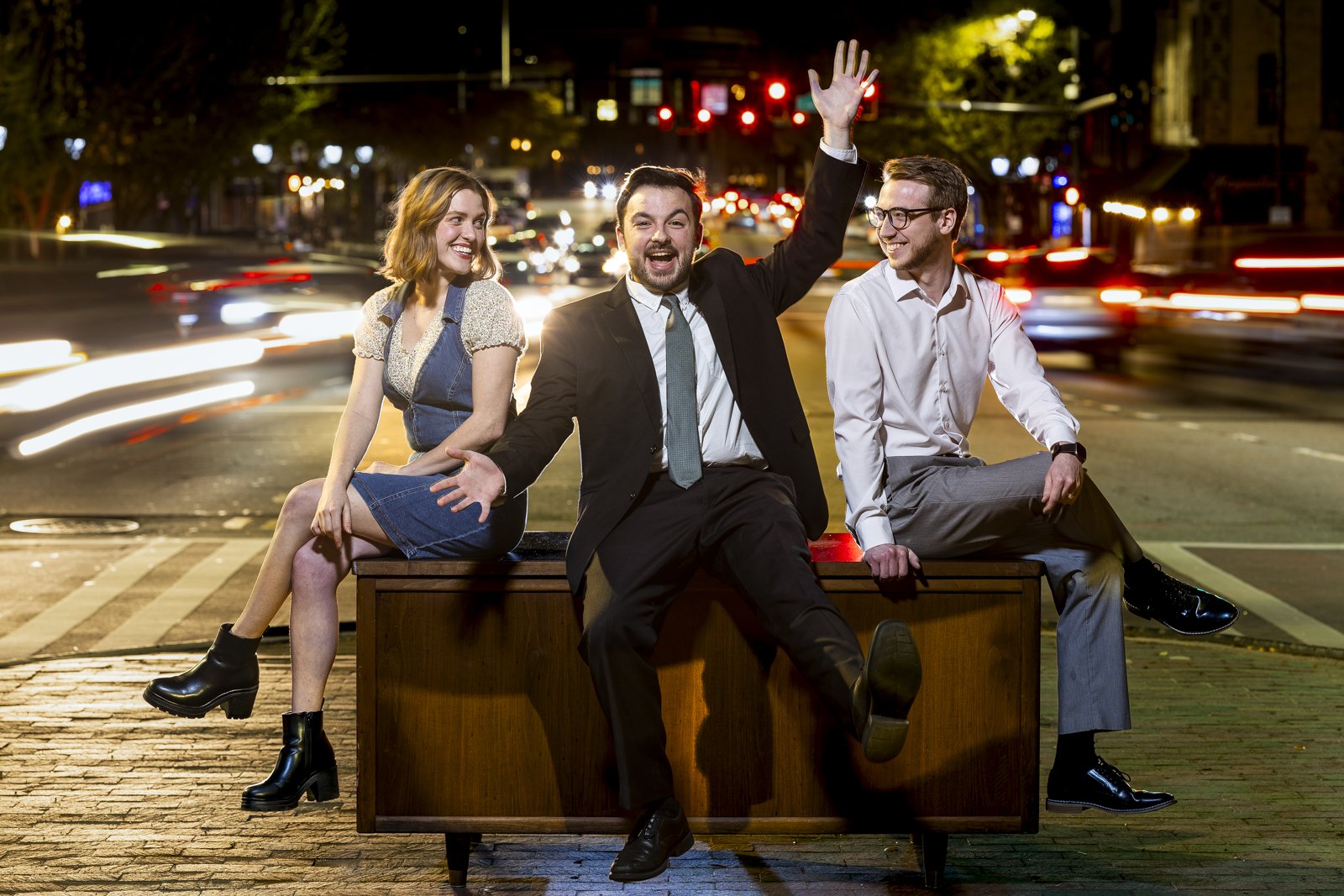Sydney Wakeford, Cam Kreitner, and Keegan Westra pose for a portrait in Downtown Athens, Ga., on February 28, 2023. The group respectively stage manages, hosts, and produces a local live late night show, Late Night in Athens.