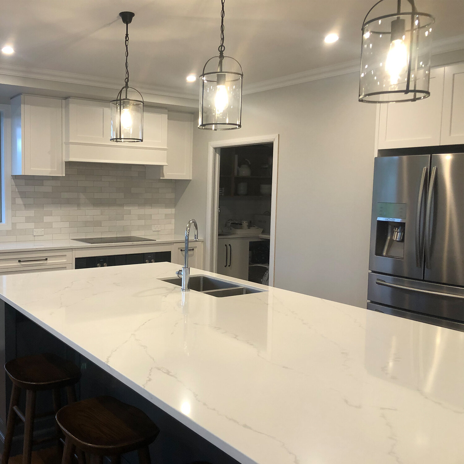 Kitchen designed by Angela at Design One Papamoa using Luna Lanterns