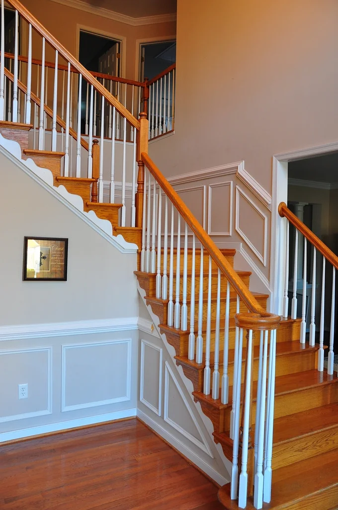 By following the stairs, this wainscoting is both elegance and playful.&nbsp;