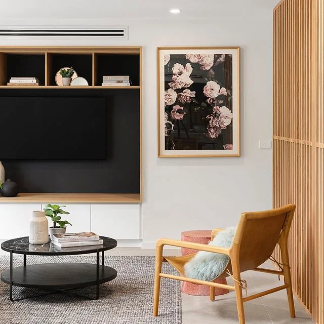 + STICK HOUSE - Montmorency, VIC
.
Cosy living space at our recently completed stick house. The Vic ash screen flowing down from the mezzanine floor above is an elegant partition to the space. .
Design + Build @cnc_constructions 
Styling + Staging @k