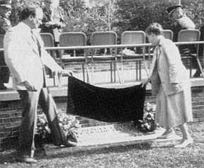 Mr. Robert C. Bell('64), President of The L.W.M.A. Alumni Association, and Mrs. Ellen Turner, Gen. Futch's daughter, unveil the marker for the Brig. Gen. T. L. Futch Parade Field.