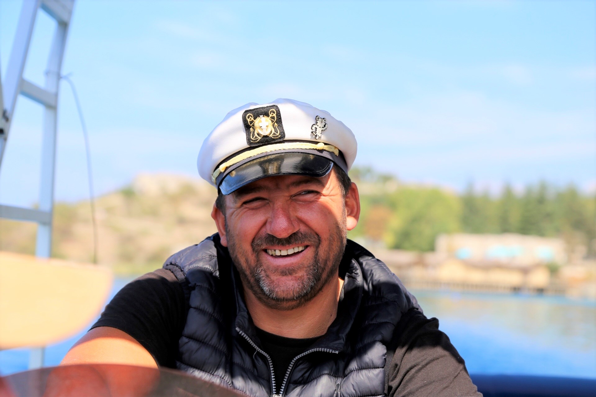 The smiling faces of Macedonia, our boat captain.