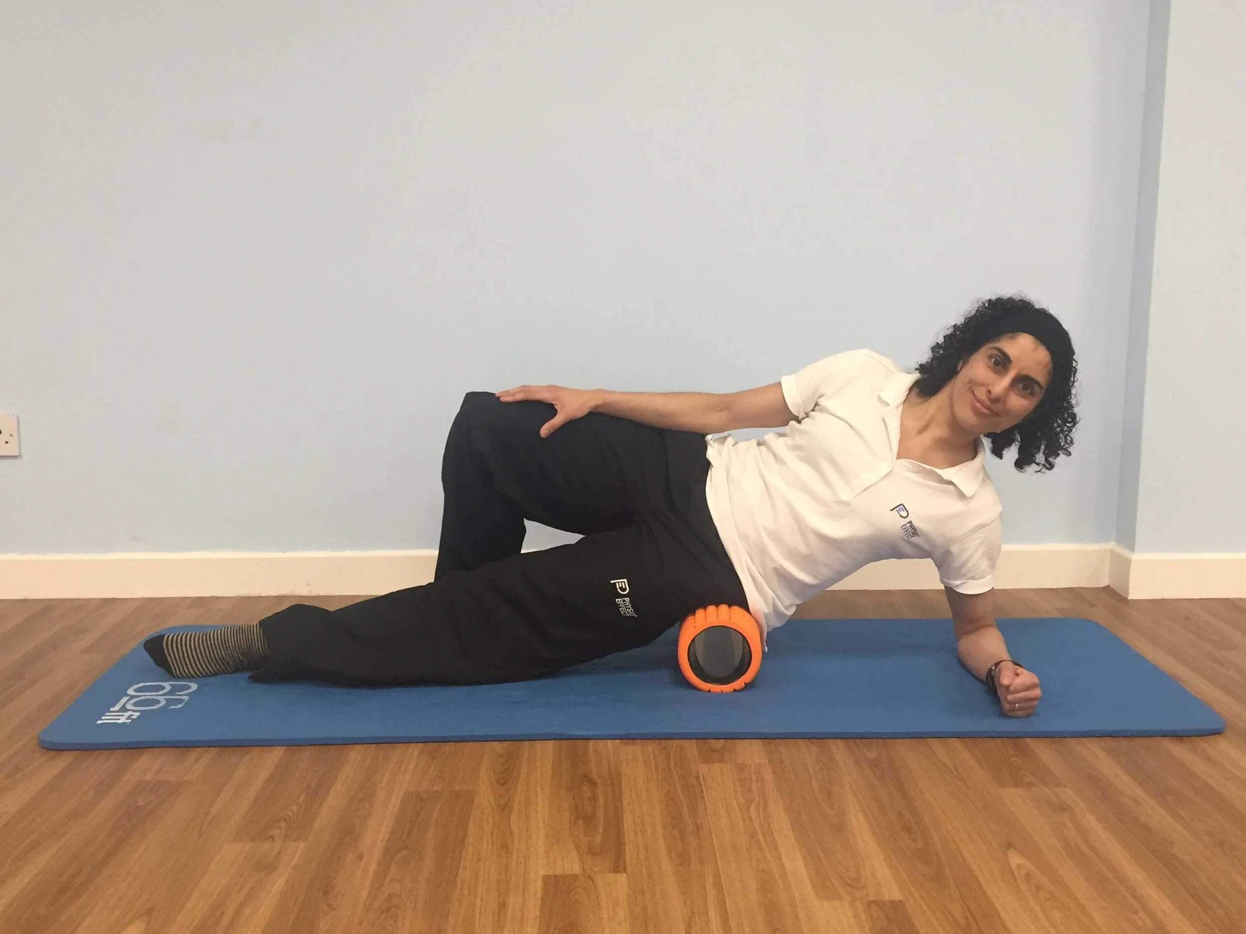 Foam rolling outer thigh 