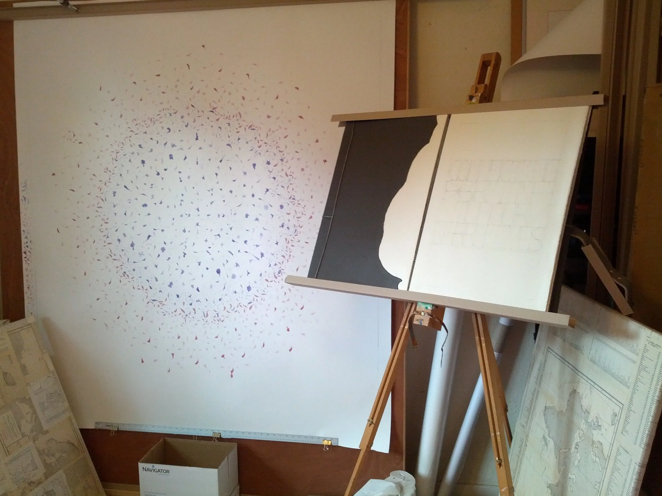 Image description; a giant ink drawing and the giant book in my studio