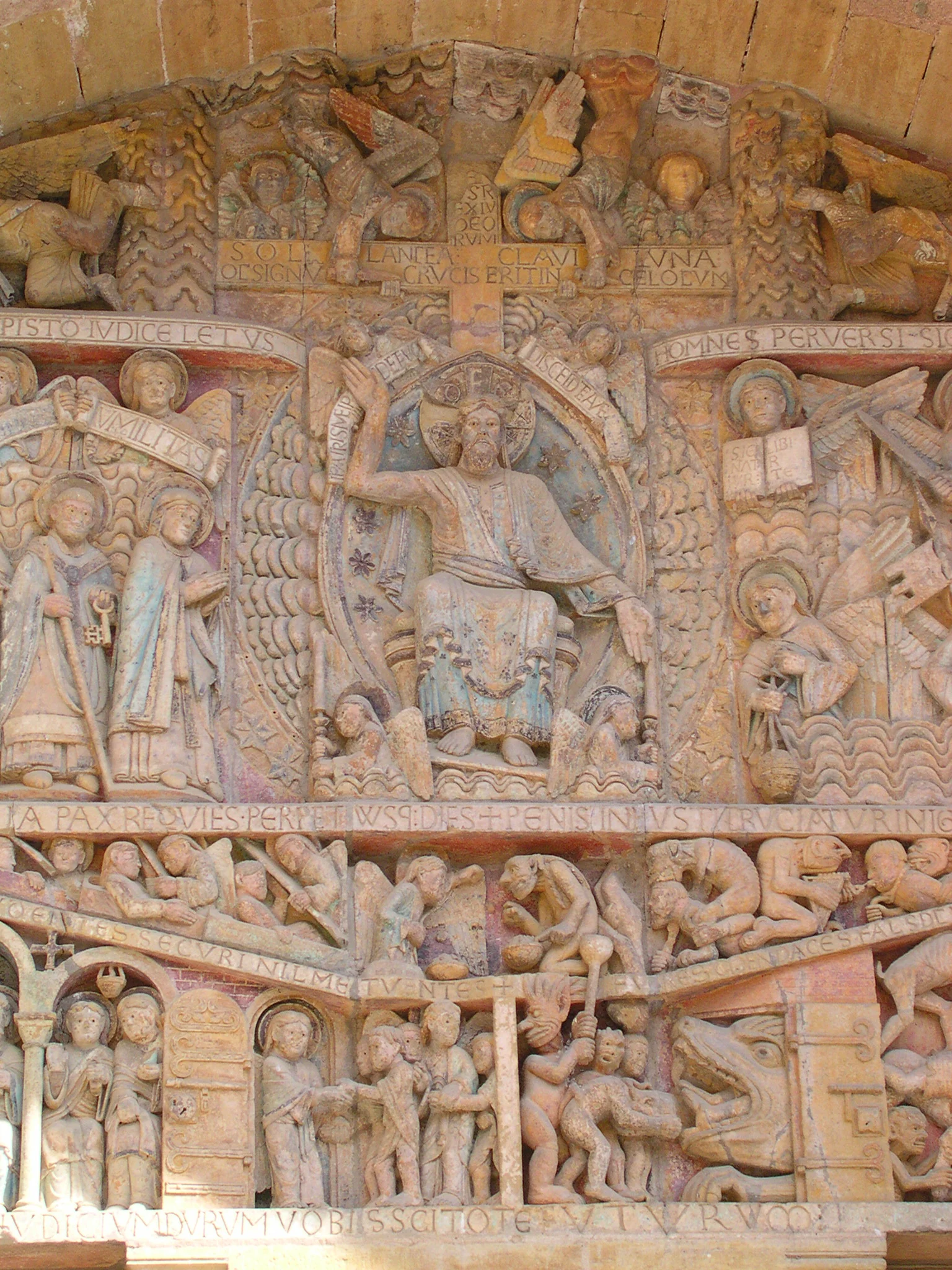 Detail of the Tympan du Jugement on the exterior of the Abbey of Sainte-Foy. By Jean-Louis Zimmerman via Flikr.
