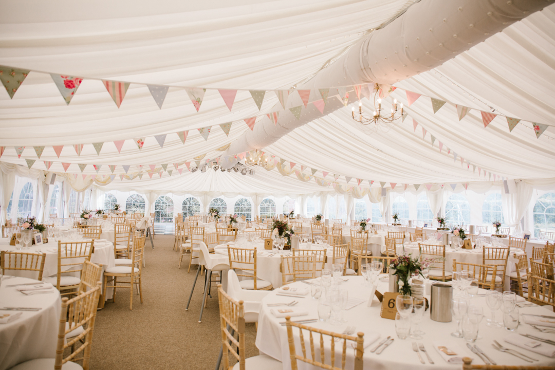 romantic style of the inside of the marquee at the walled garden at beeston fields